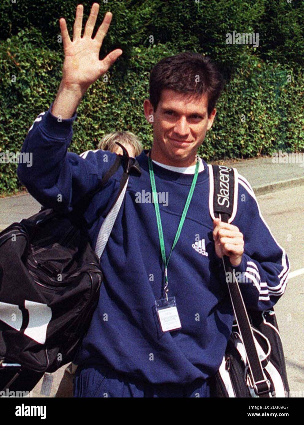 No Commercial Use: British tennis star Tim Henman arrives at the Wimbledon Tennis Championships ahead of his match against American Jim Courier. Stock Photo