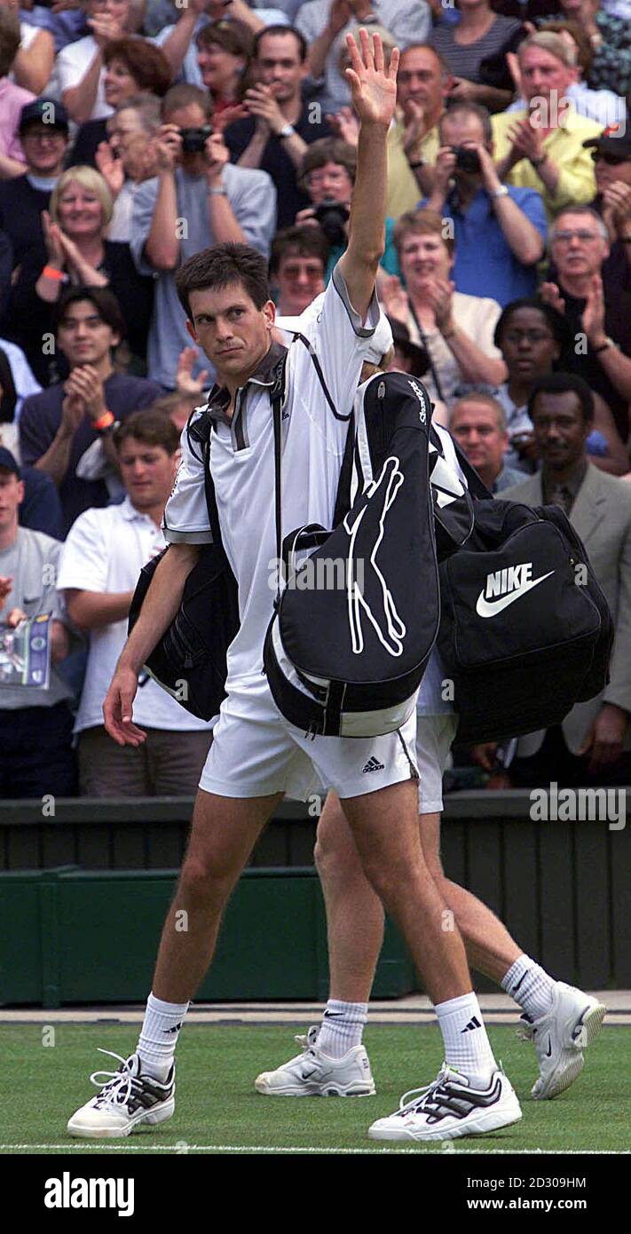 No Commercial Use: Tim Henman waves to the Centre Court crowd after defeating American Jim Courier  4-6  7-5  7-5  6-7  9-7  at the Wimbledon Tennis Championships.  Stock Photo