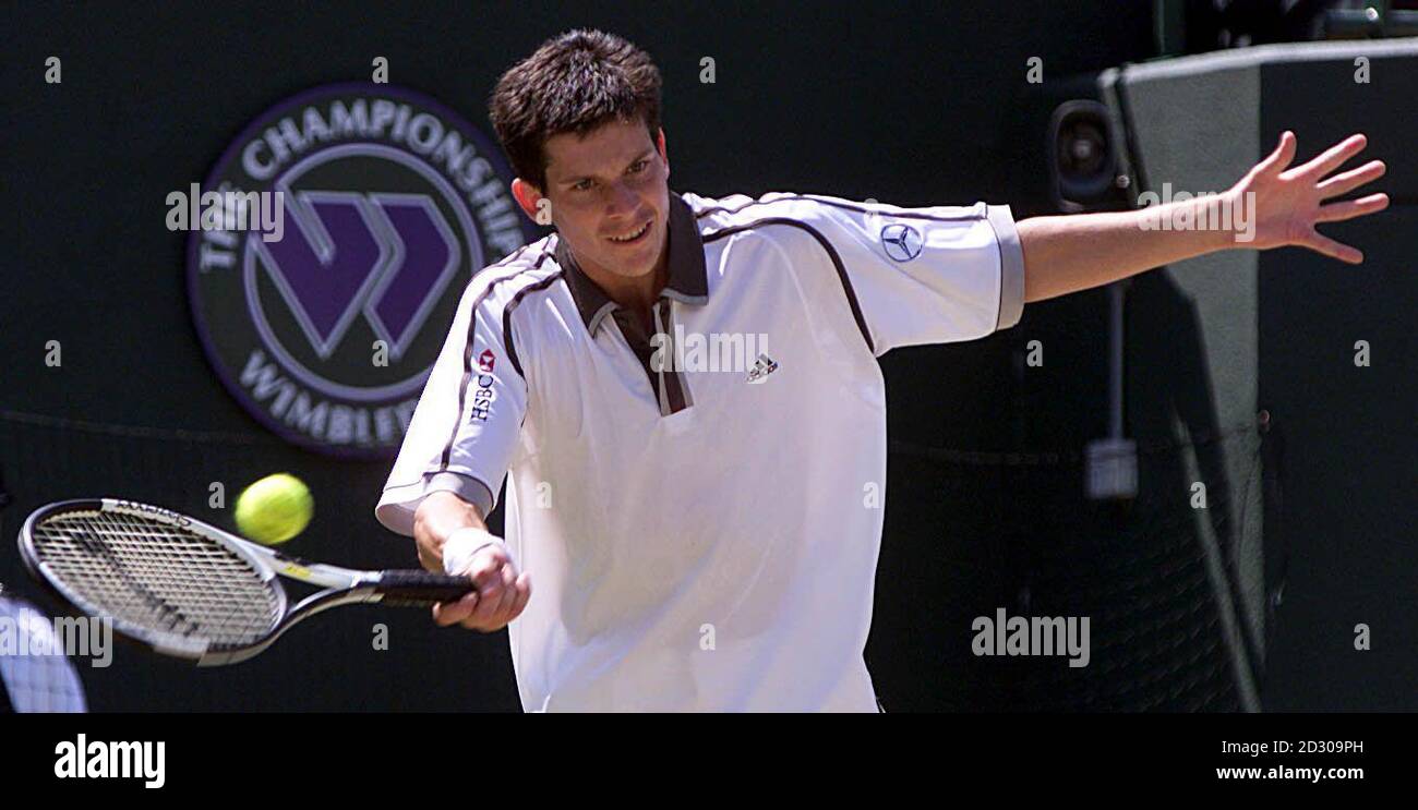 No Commercial Use. British tennis star Tim Henman in action during his quarter final match against Cedric Pioline of France at Wimbledon. Stock Photo
