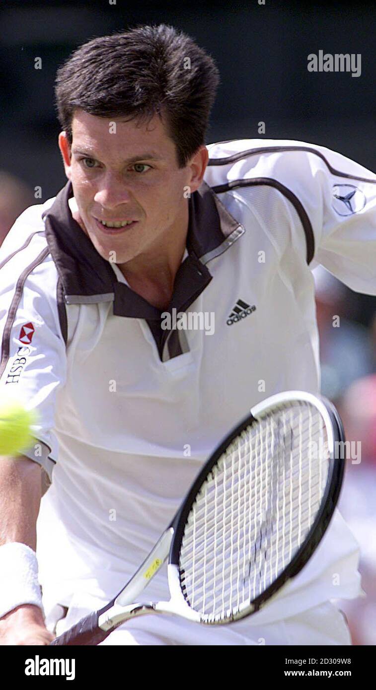 No Commercial Use. British tennis star Tim Henman in action during his semi final match against Pete Sampras of USA at Wimbledon. Stock Photo