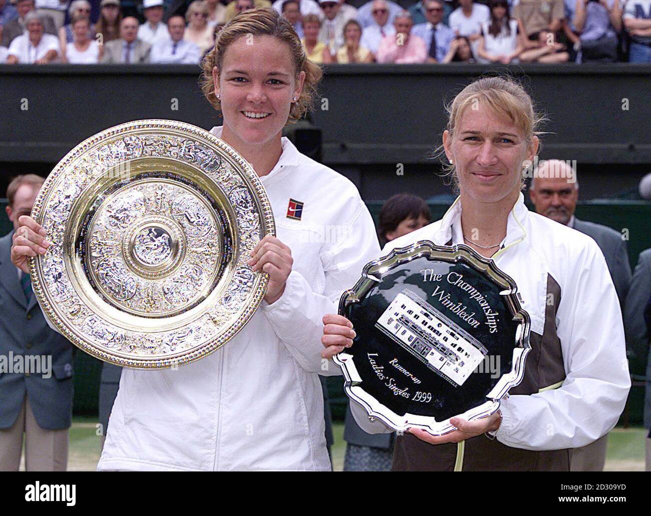 No Commercial Use : Ladies' Singles winner Lindsay Davenport (left) and  runner up Steffi Graf pose for photographgers at Wimbledon. Davenport  defeated Germany's Steffi Graf 6-4 7-5. 13/7/99: Graf confirms she will