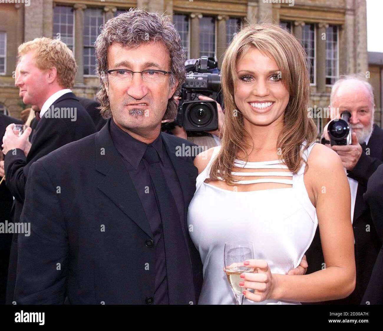 Jordan formula one team boss Eddie Jordan poses with page 3 model Jordan at  the celebrity ball in aid of Children with Leukimia, at Stowe school in  Northants Stock Photo - Alamy