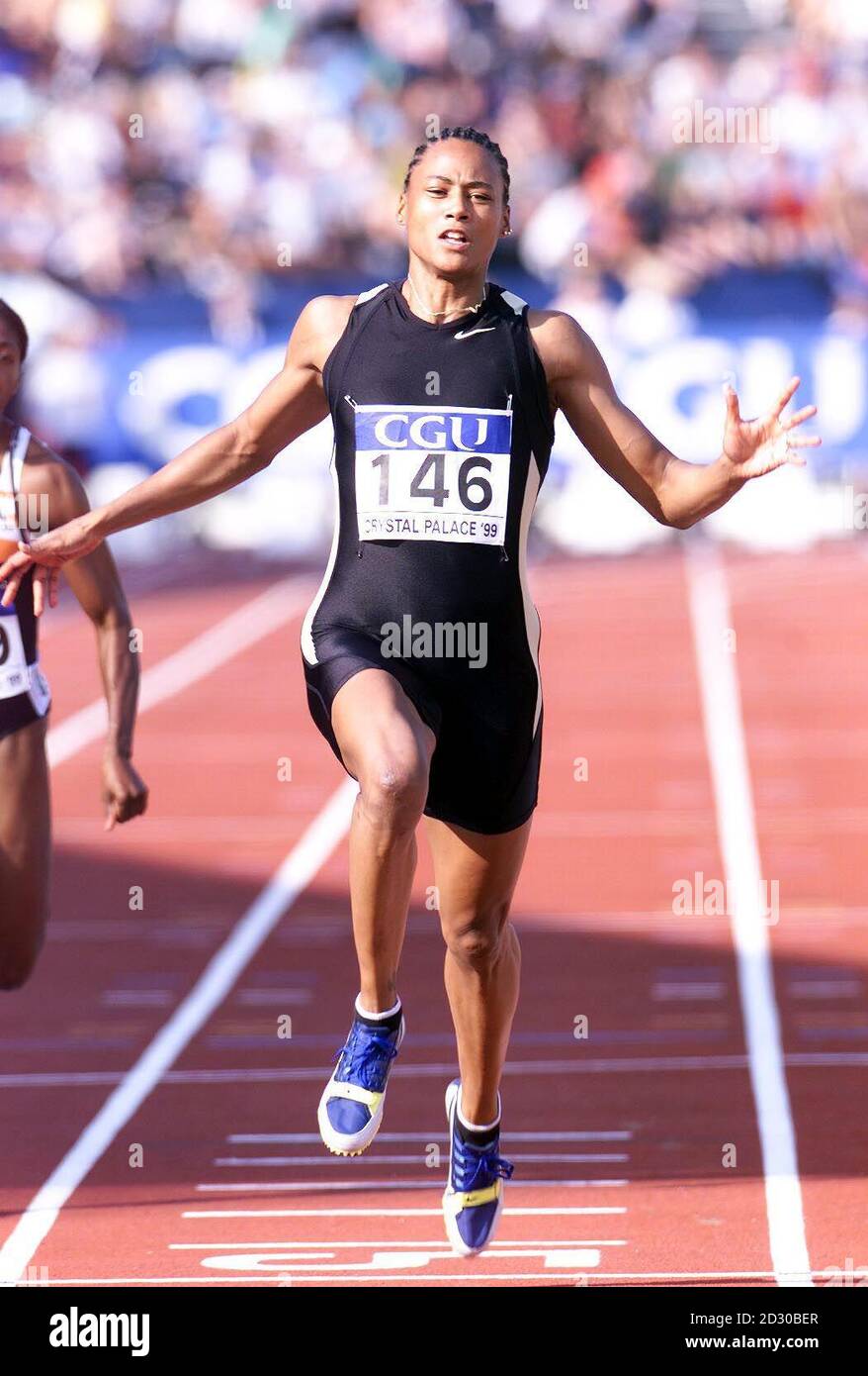 Marion Jones, of the USA, the World 100 m Champion, wins the 100m in 10.80 seconds , a world best this year, at the British Grand Prix, international Athletics meeting, at Crystal Palace, London. Stock Photo
