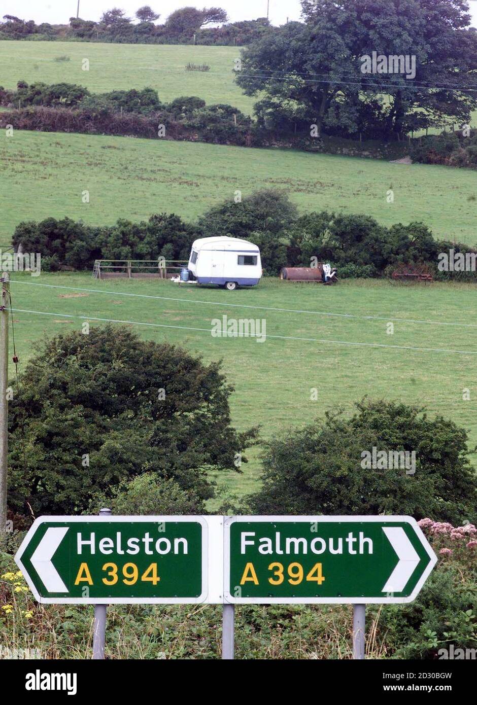 A single caravan sits in a farmer's campsite, near the Lizard Peninsula, South Cornwall, today Monday 9 August 1999, as estimates for massive crowds descending on Cornwall for Wednesday's total eclipse continue to look optimistic. PA Photo : Toby Melville *EDI* Stock Photo