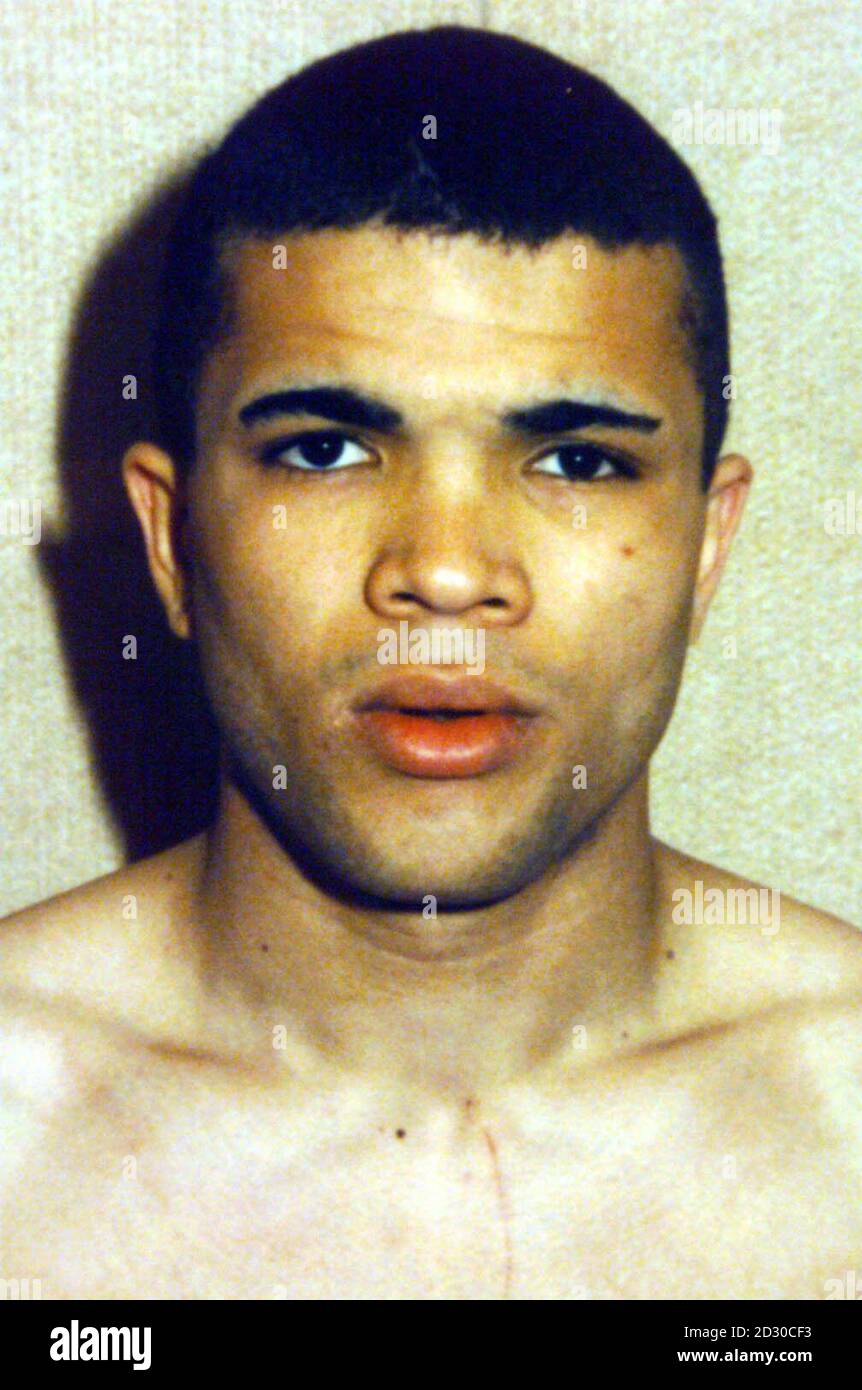 Police collect of murder suspect Stephen Akinmurele who was found hanged in his cell at Manchester Prison. Akinmurele, was charged with 5 murders and investigated in connection with a number of other deaths on the Isle of Man and around Lancashire. * 2/10/00: a Manchester inquest jury ruled he killed himself in August 1999, weeks before he was due to stand trial for murdering three Blackpool pensioners. The inquest heard that just weeks before his trial he was found by prison officers at Manchester Prison, where he had been on remand, hanging from a ligature. Charges of the murder of two pe Stock Photo