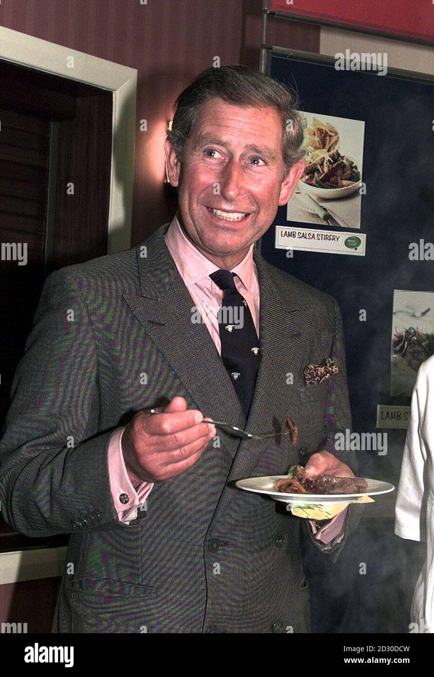 The Prince of Wales enjoyed a plate of lamb stir fry during a visit to the Royal Welsh Show ground in Builth Wells, mid Wales. * The Prince was promoting the Meat and Livestock Commission's 'Quick lamb' campaign to boost sales of British lamb and widen its appeal to consumers. SEE PA story ROYAL Sheep. **EDI** WPA/PA Picture DAVID JONES. Stock Photo
