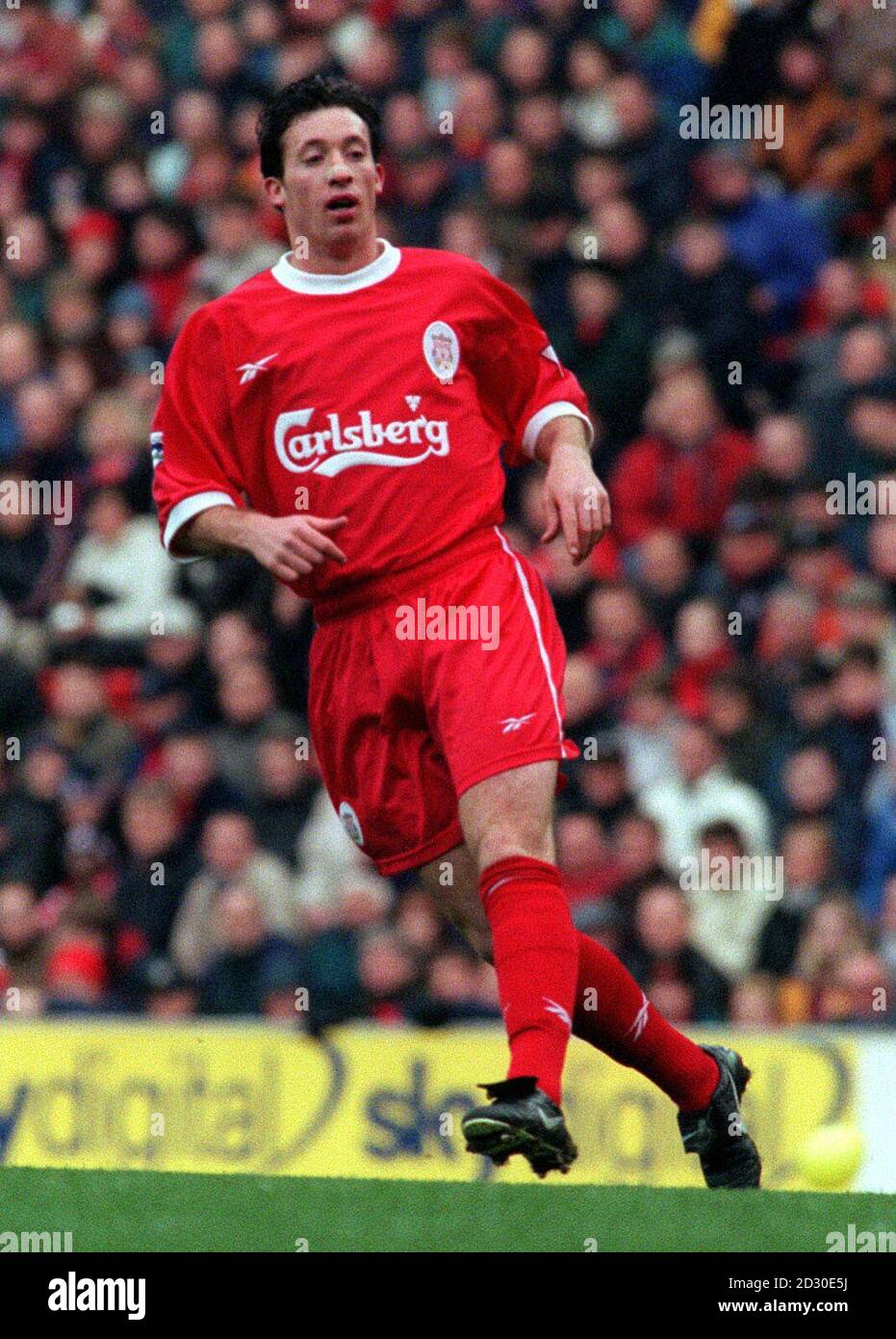 This picture may only be used within the context of an editorial feature : Liverpool striker Robbie Fowler in action against Southampton during the FA Carling Premiership match at Anfield, which Liverpool won 7-1  * 1/10/99 Liverpool announced that Fowler will go into hospital for an ankle operation that could keep him out until December. Liverpool s medical experts made the decision when it became clear that the problem Fowler has had since he returned from international duty in Poland a month ago was not going to clear up with rest. Stock Photo