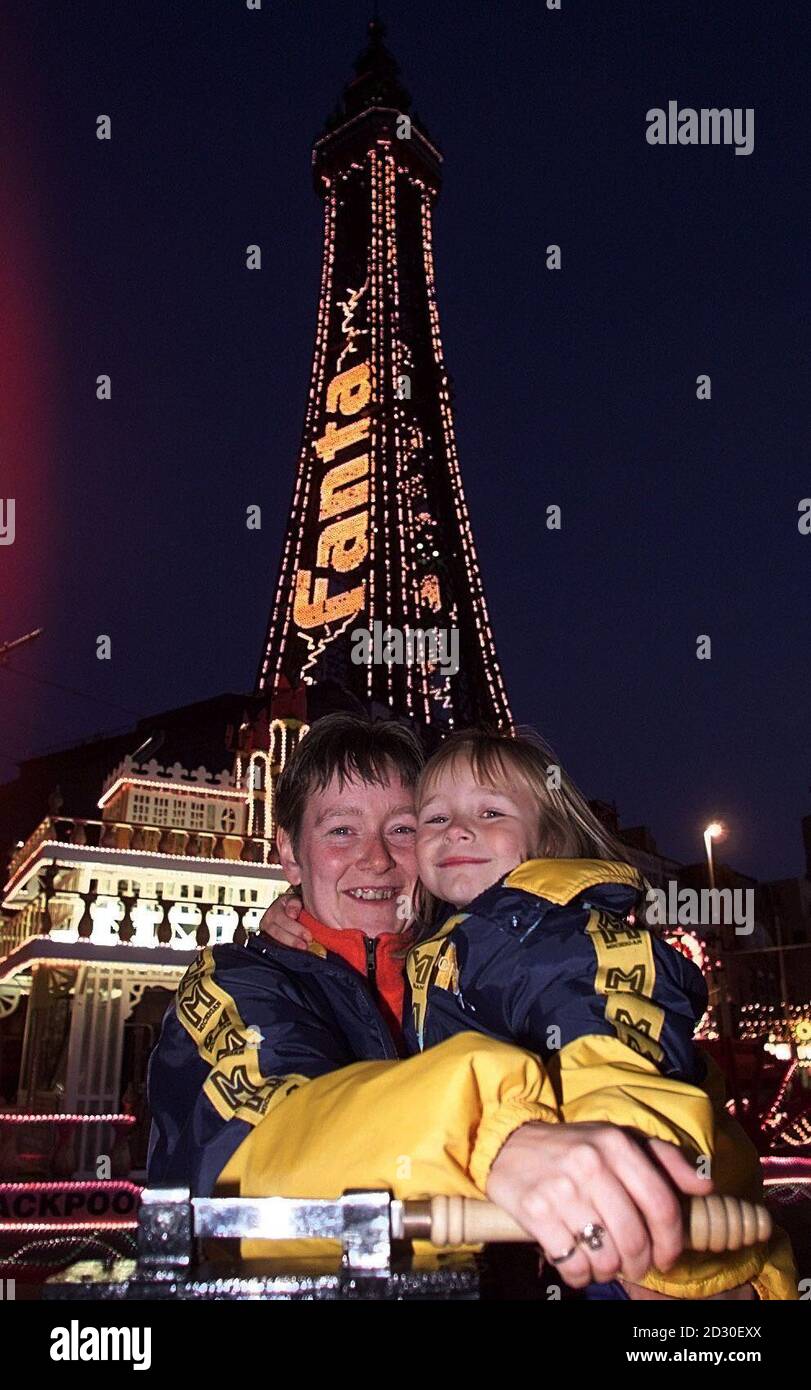 Sharon Davison from Wakefield, Yorkshire, with her daughter Charlotte as they turn on the Blackpool illuminations. Sharon had won a holiday to Paris but turned it down in favour of a trip to Blackpool. Stock Photo