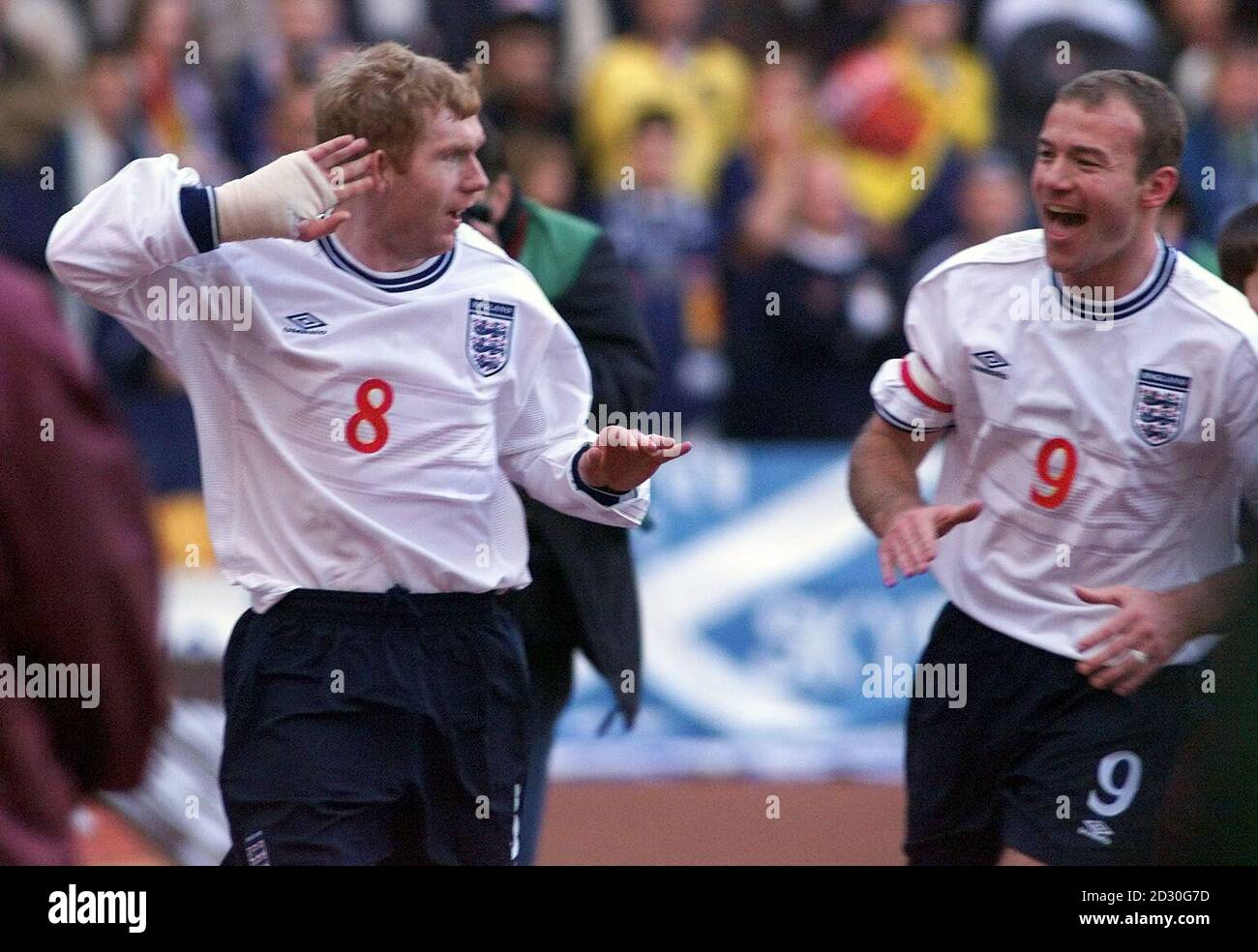 https://c8.alamy.com/comp/2D30G7D/this-picture-can-only-be-used-within-the-context-of-an-editorial-feature-englands-paul-scholes-l-celebrates-his-first-goal-with-captain-alan-shearer-during-the-euro-2000-football-match-between-england-and-scotland-at-hampden-park-final-score-scotland-0-england-2-2D30G7D.jpg