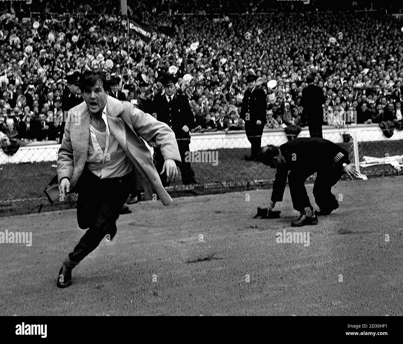 Football pitch invasion 1966 final Black and White Stock Photos