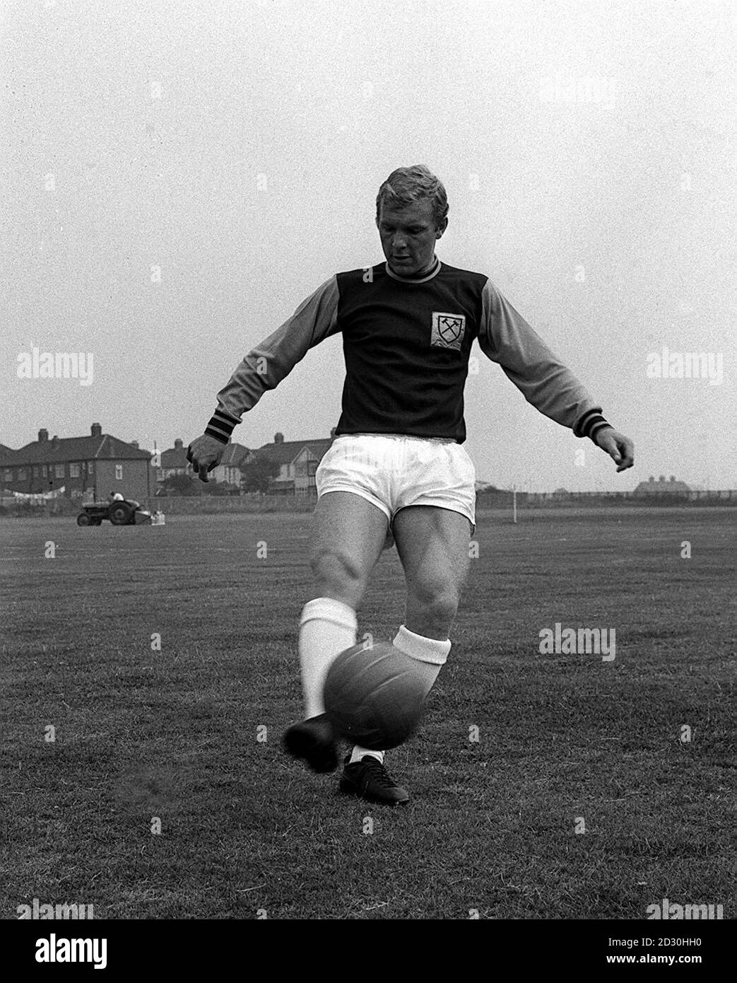 Captain of West Ham United and England, footballer Bobby Moore juggling a football in training. Stock Photo