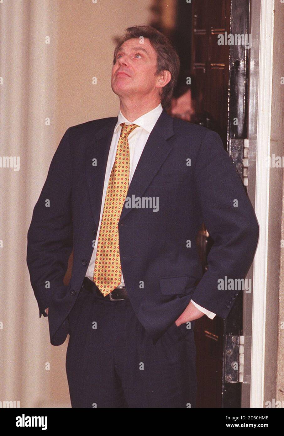 Prime Minister Tony Blair stands at the door of No10 Downing Street following the departure of representatives of the islands attending the inaugural meeting of the British-Irish Council. Stock Photo