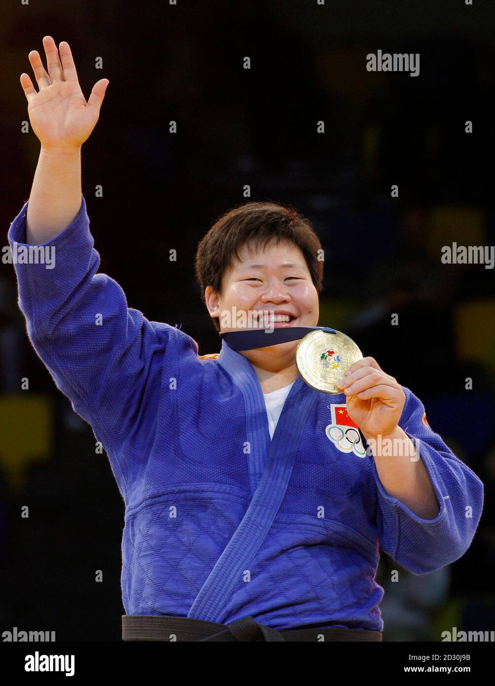 Gold medallist Wen Tong of China poses during the medal ceremony during the  women's category of the World Judo Open Championships in Levallois near  Paris December 21, 2008. REUTERS/Benoit Tessier (FRANCE Stock