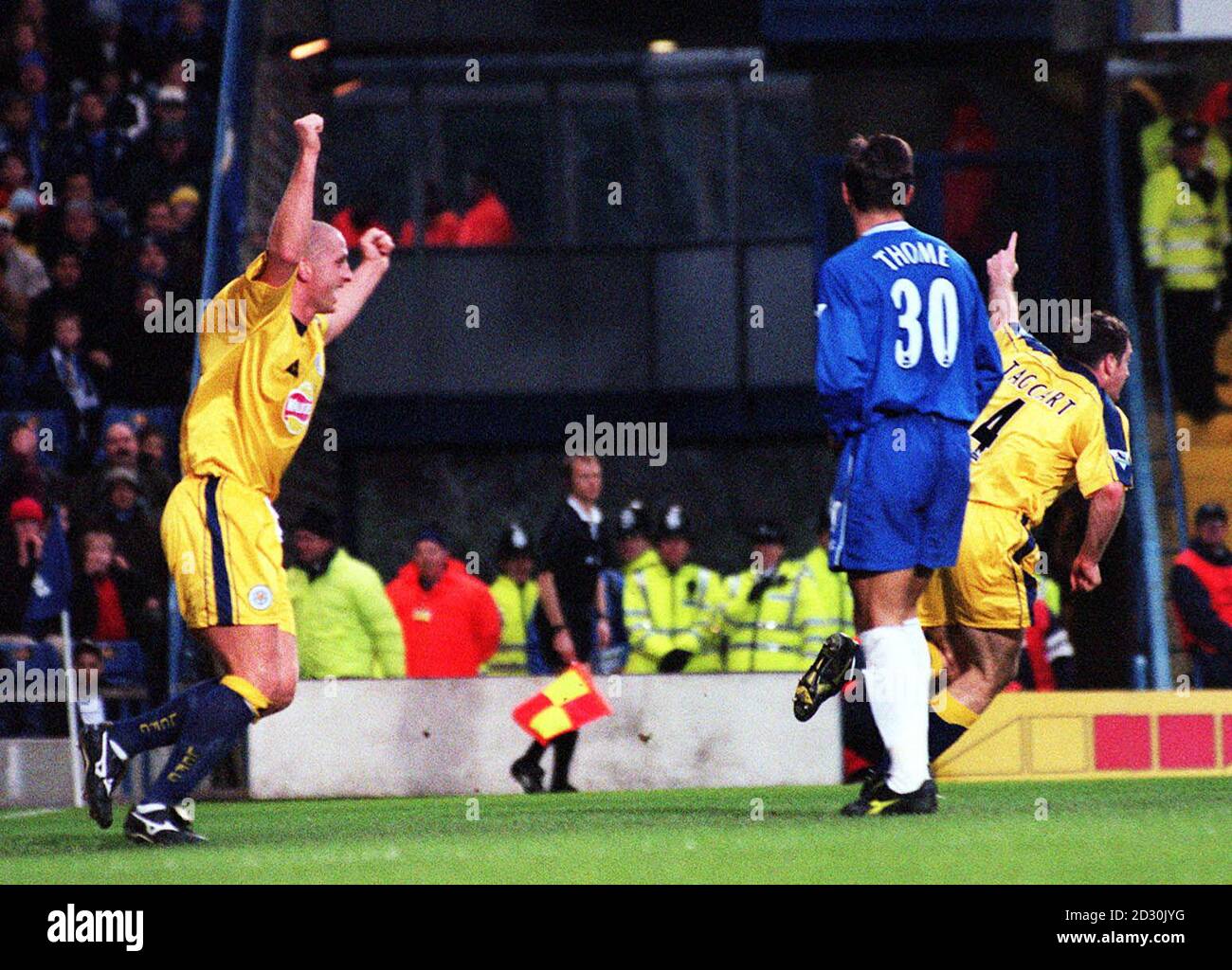 This picture can only be used within the context of an editorial feature. Leicester City's Matt Elliot (L) celebrates after Gerry Taggart (R) beat Chelsea's goalkeeper Ed de Goey to score, in their FA Premiership football match at Stamford Bridge, London. Stock Photo