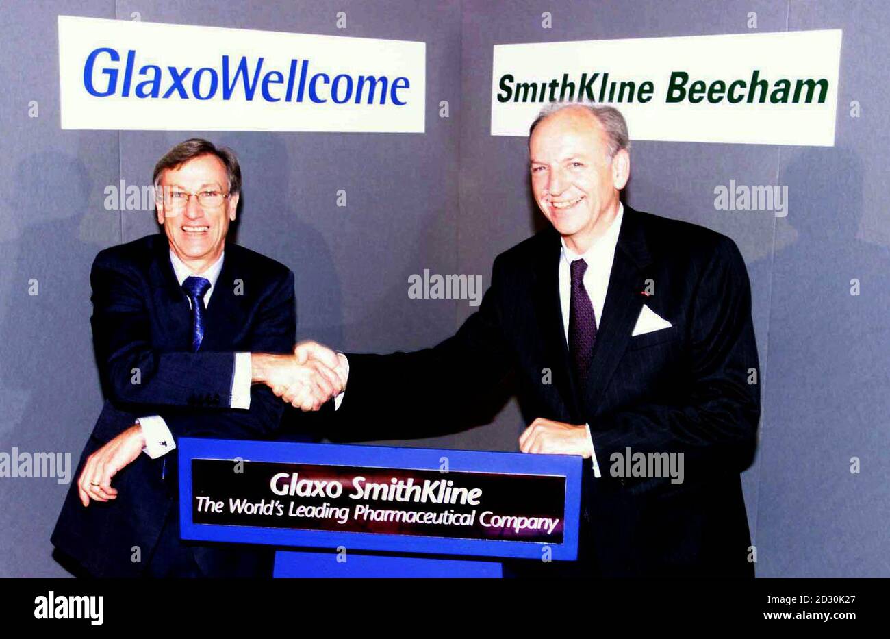 photocall of the merger between drug companies glaxo wellcome and smithkline beecham in london l r sir richard sykes and jean pierre garnier the agreed deal will create the world s largest pharmaceuticals group