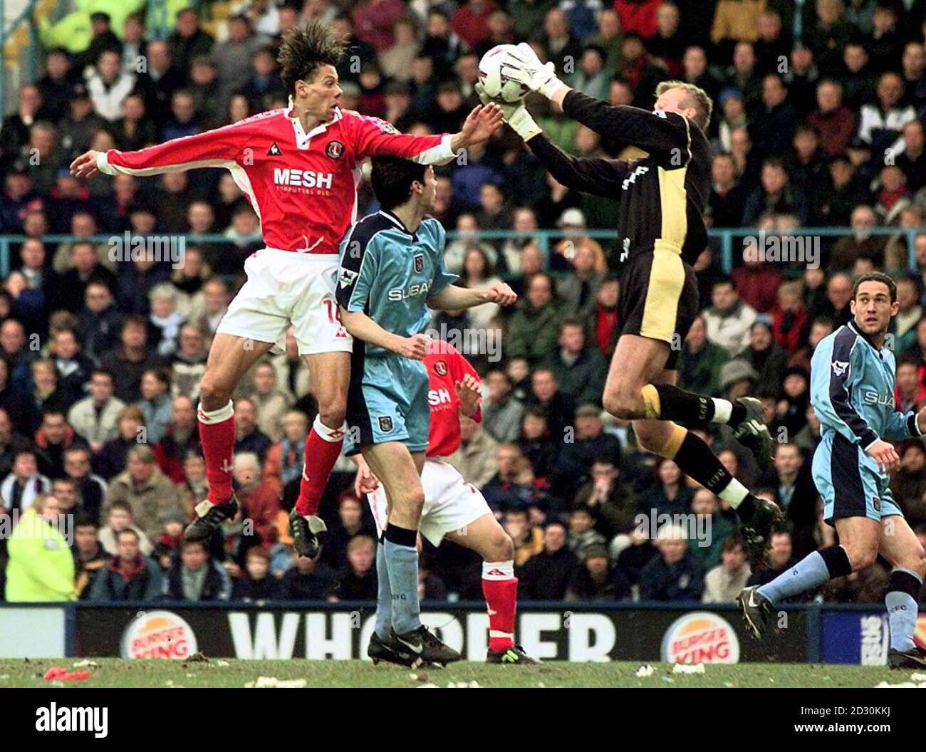 This picture may only be used within the context of an editorial feature. Coventry City's goalkeeper Magus Hedman saves from Charlton Athletic's Martin Pringle during the FA Cup Fifth Round football match at Highfield Road.   Stock Photo