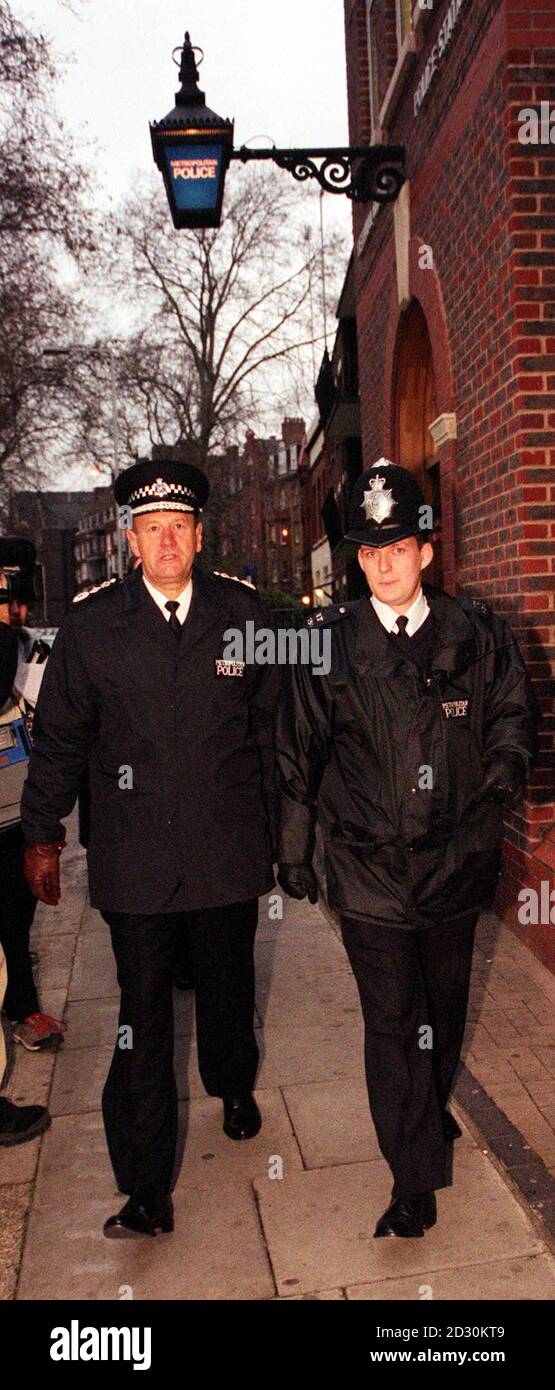 The new Commissioner of the Metropolitan Police, Sir John Stevens (L), joins PC John Luxford on the beat as they leave Bethnal Green Police Station, on his first day in charge of London's bobbies. Sir John has issued a 10-point police plan to cut crime.  * ...and bureaucracy and pledged to make London a safer place. He has also warned of a police recruitment crisis because of poor pay and the battering the force received over the bungled Stephen Lawrence murder investigation. Stock Photo