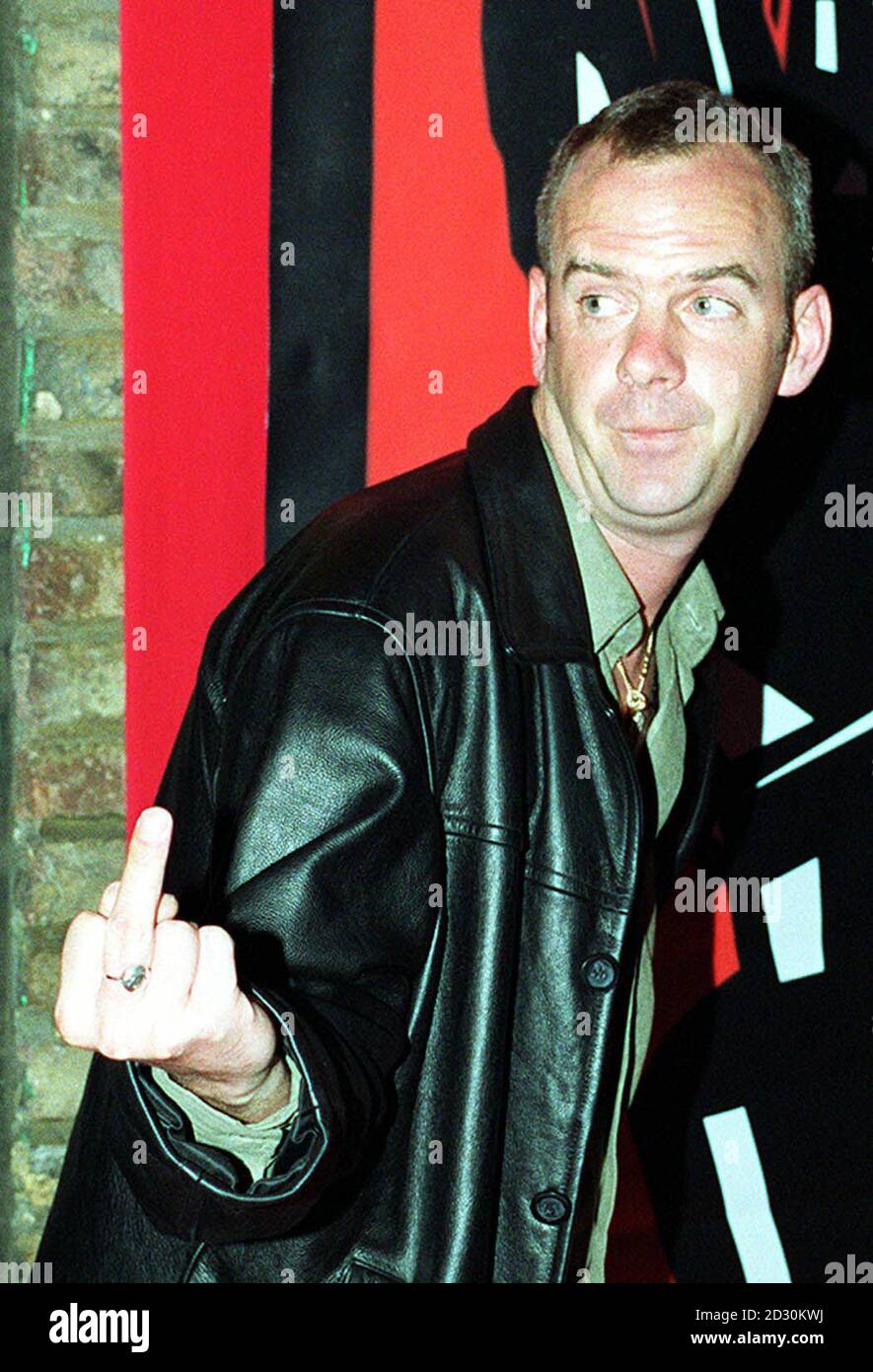 DJ and husband of TV presenter Zoe Ball, Fat Boy Slim AKA Norman Cook, arriving at the NME Awards at the Mermaid Theatre in Central London. Stock Photo
