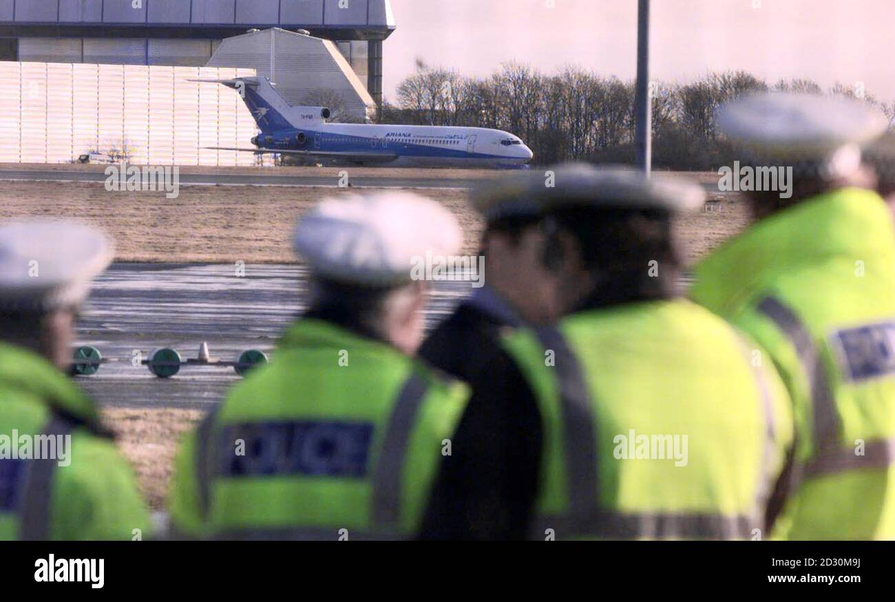 A large police presence situated at Stansted airport, Essex, on-standby as negotiations for the hijacked Ariana Airlines Boeing 727 continues, where about 150 people, including 21 children, are being held by armed hijackers.  *  They seized control of the jet on an internal flight in Afghanistan. Stock Photo