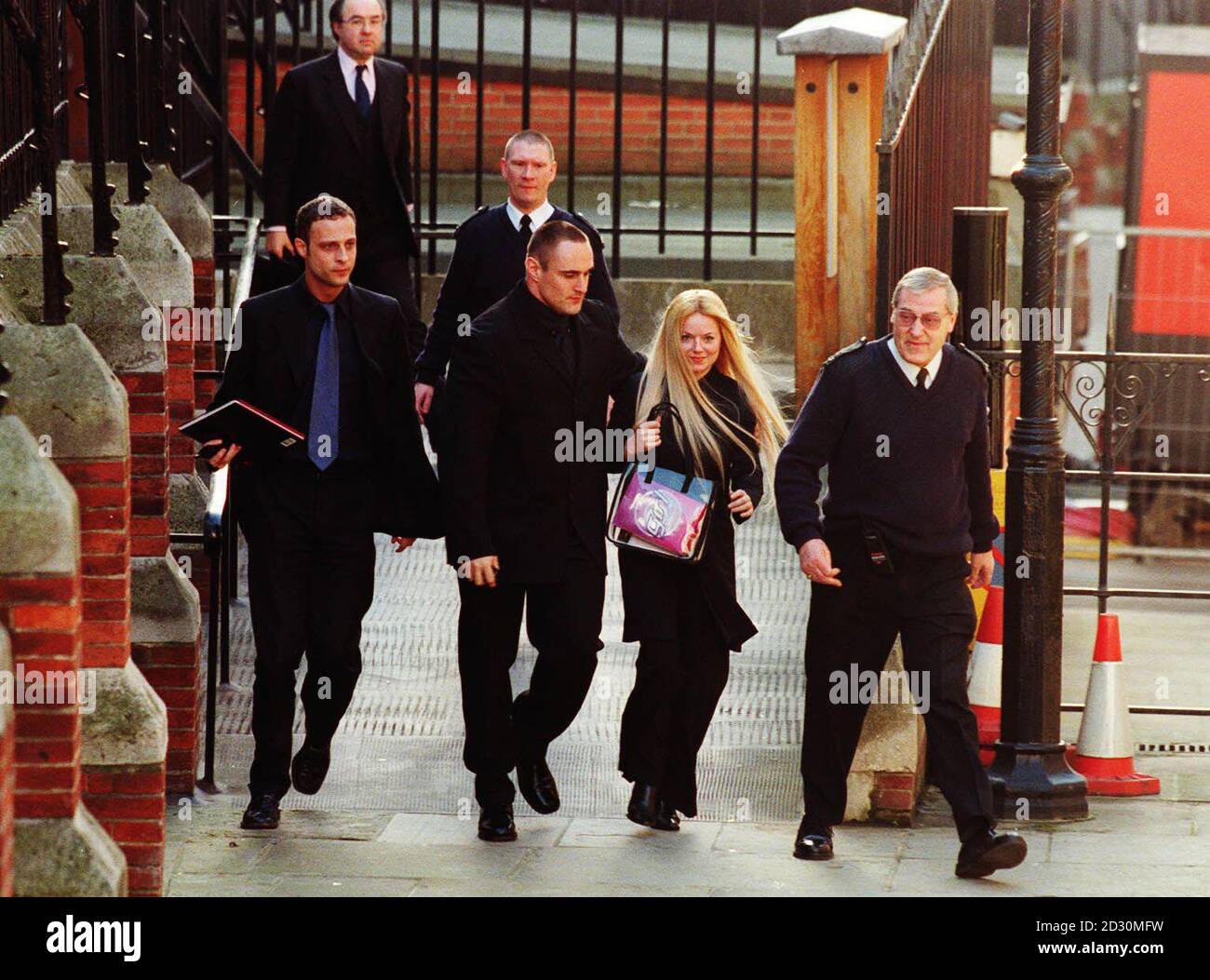 Geri Halliwell arrives at the High Court, London, to give evidence for the Spice Girls in a legal action between the band and official sponsors of their 1998 world tour.   * In the complex two-way case, Italian motorcycle manufacturers Aprilia says that the pop diva s departure cost them  1.6 million in lost profits.  The band signed a   500,000 contract with Aprilia to promote their products, including a special Spice Sonic scooter with a picture of all five girls on it. S Stock Photo