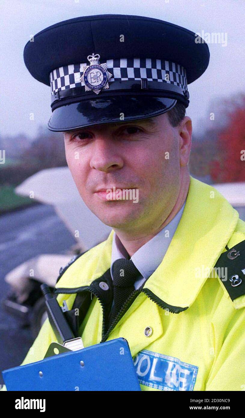 Undated picture of police officer Bill Jenkins, who arrested a man he was chasing by pretending to be a dog and barking at the criminal. Lee Henry, 18, from Cheltenham, was sentenced at Gloucester Crown Court to 14 months in prison.  * ...after being convicted earlier this year of  driving while disqualified and driving dangerously and breaching a conditional discharge. Stock Photo