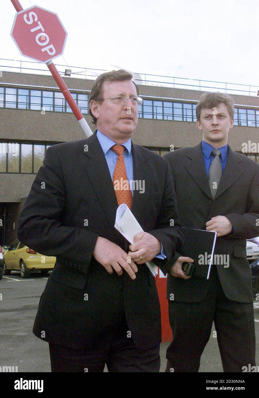 Ulster Unionist leader David Trimble (L), with his press aide David