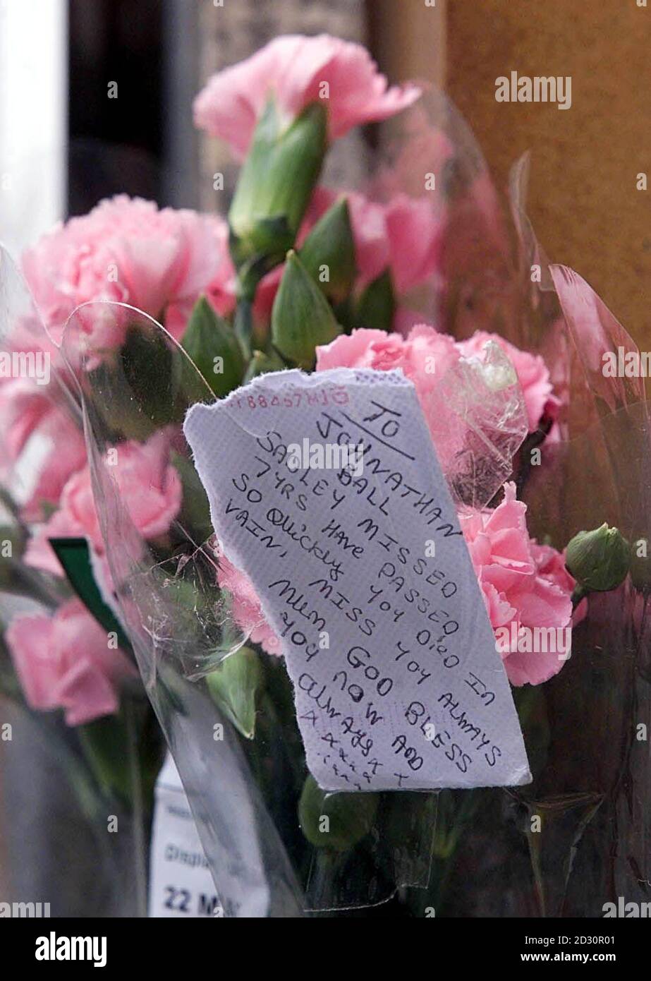 A floral tribute to Jonathan Ball from his mother is laid by the memorial to her son and Tim Parry on Bridge Street in Warrington. The Duchess of Kent is due to officially open a  3 million peace centre, dedicated to the two young boys who died in an IRA bomb blast. Stock Photo