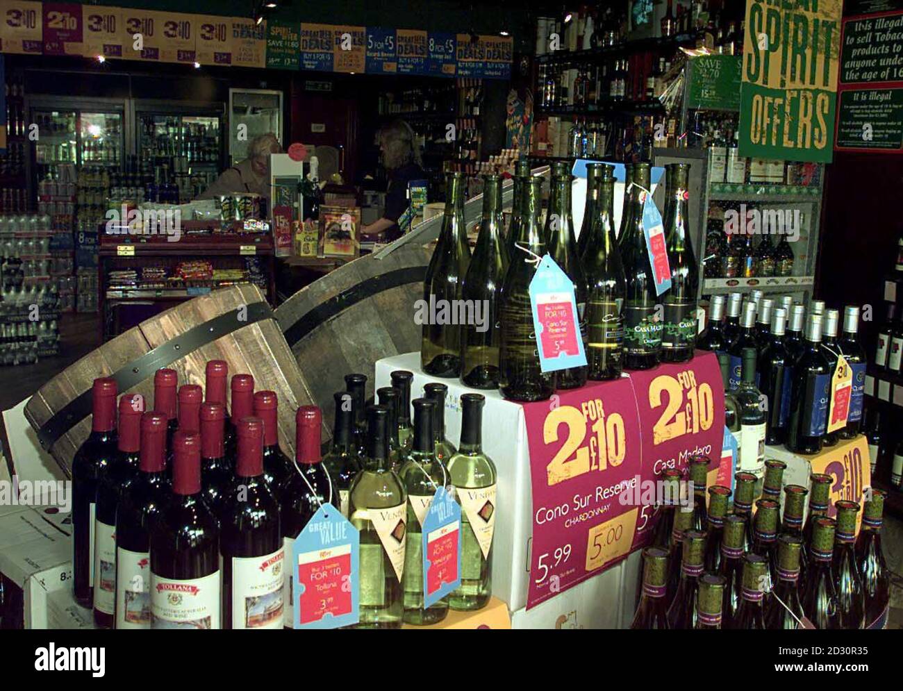 Bottles of wine on display at an Off Licence in Ashby De La Zouch, on the day that Britain's Chancellor Gordon Brown announced in his Budget that duty on all spirits were frozen, beer to rise 1p a pint and wine to rise 4p a bottle. * 02/7/02: All alcoholic drinks sold in the UK should state how many units they contain and display warnings about their potential dangers, doctors were being told.The British Medical Association was debating alcohol and drugs at its Annual Representatives Meeting in Harrogate. Dr Eddie Coyle, chairman of the BMA's public health committee, was today proposing a mot Stock Photo