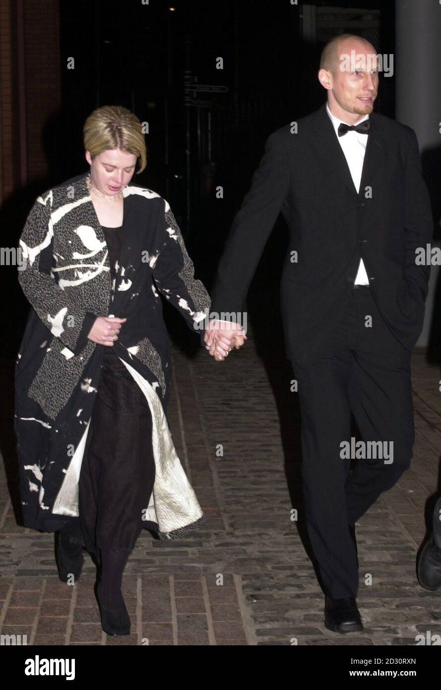 This picture can only be used within the context of an editorial feature. Manchester United defender Jaap Stam arrives at a testimonial dinner held for the club's manager Sir Alex Ferguson, at the G-Mex Centre, Manchester. Stock Photo