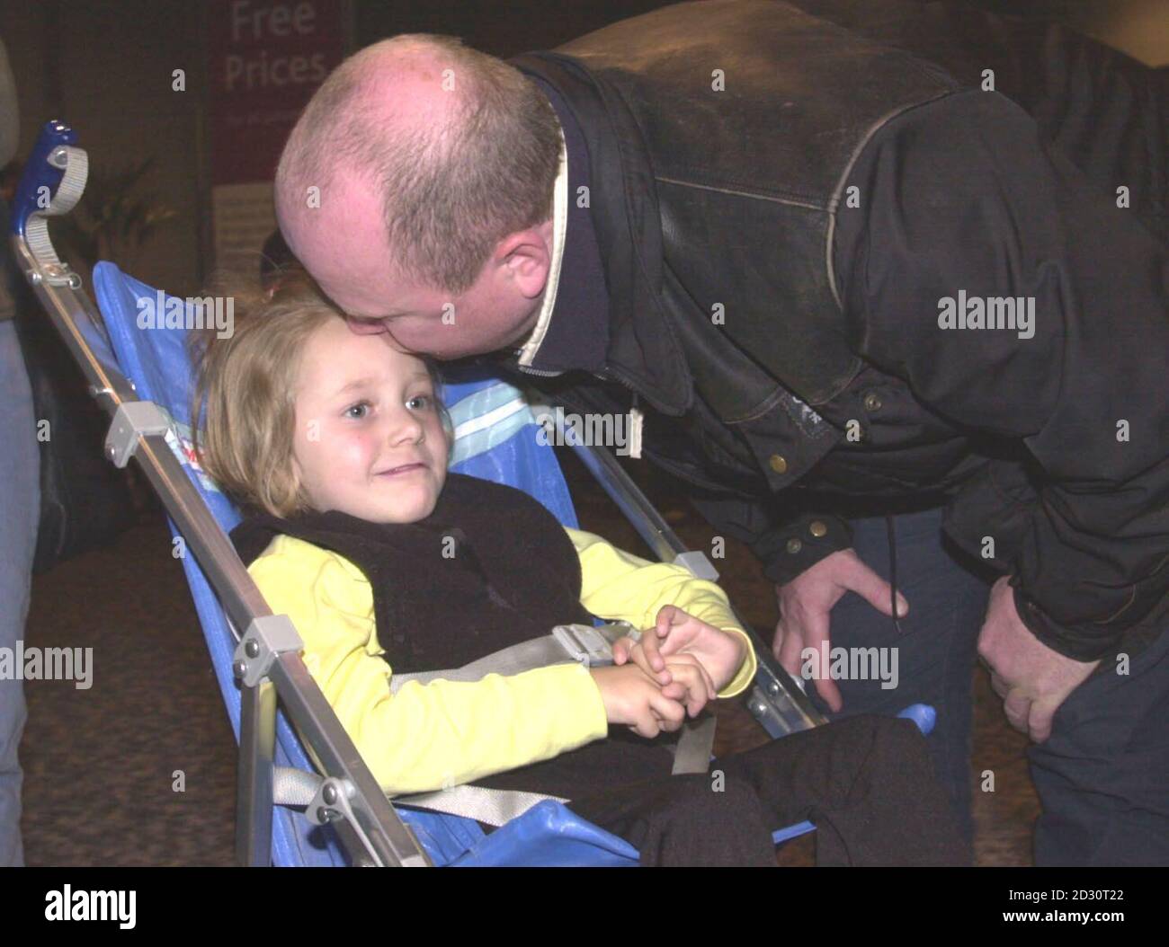 EastEnder's star Steve McFadden with Leah Thornton, 6, of Blaby, Leicestershire, who suffers from Rett's syndrome, an  incurable condition which only affects girls and means she is unable to walk, talk or even chew food properly.  *  Mr. McFadden met with Leah before she departed from Heathrow Airport for a 3 week holiday in Florida, USA.  The trip will include a week swimming with Dolphins.  Stock Photo