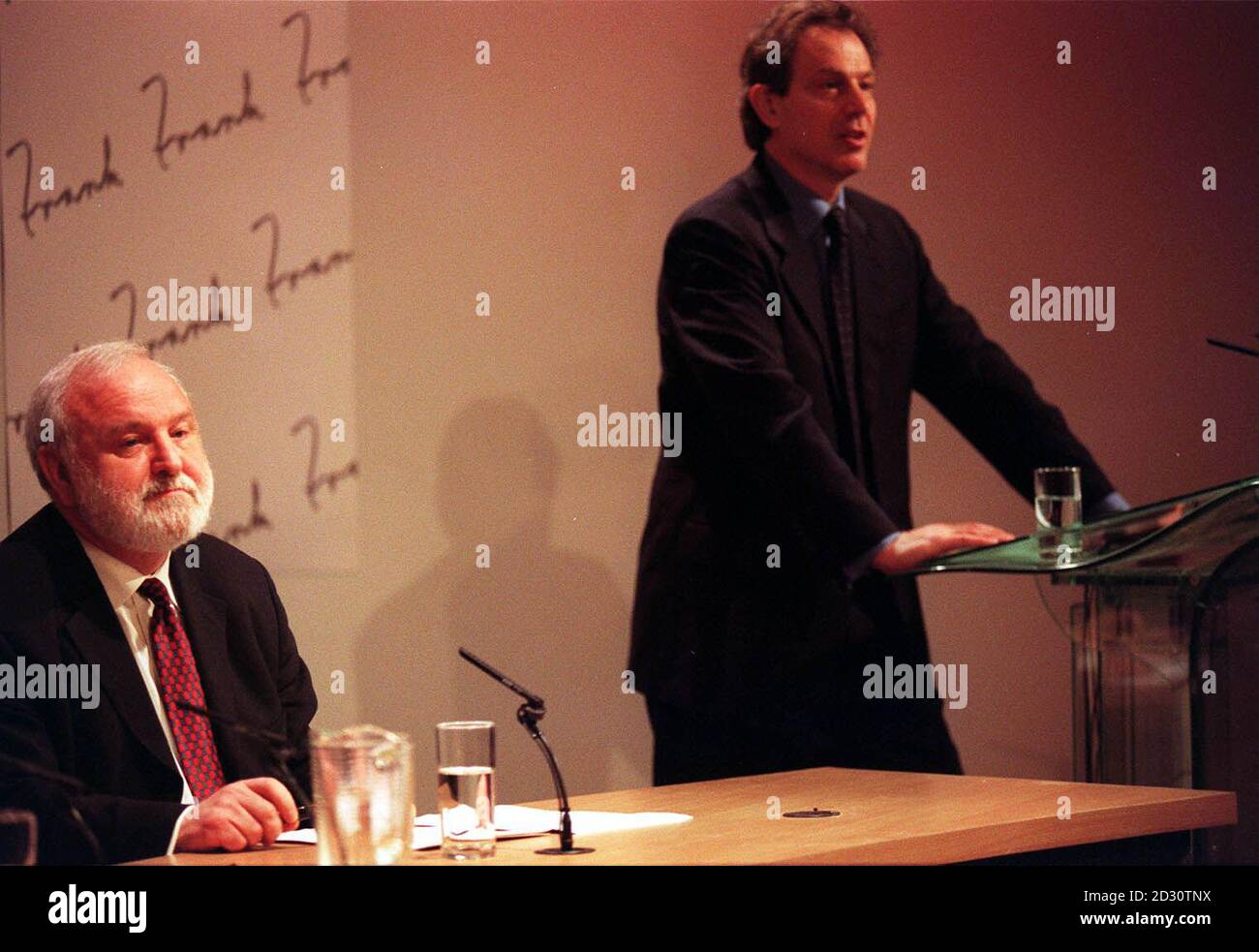 Prime Minister Tony Blair with Labour mayoral candidate Frank Dobson, during a press conference held at Millbank Tower  in central London. Stock Photo