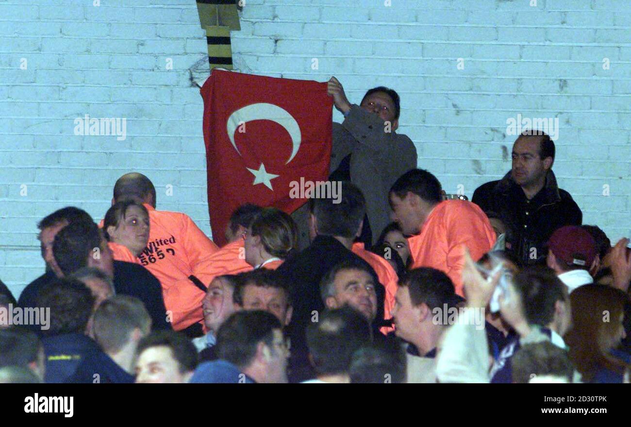 A fan holding a Turkish flag at Elland Road, ahead of the UEFA Cup football Match between Leeds and Galatasaray. Stock Photo