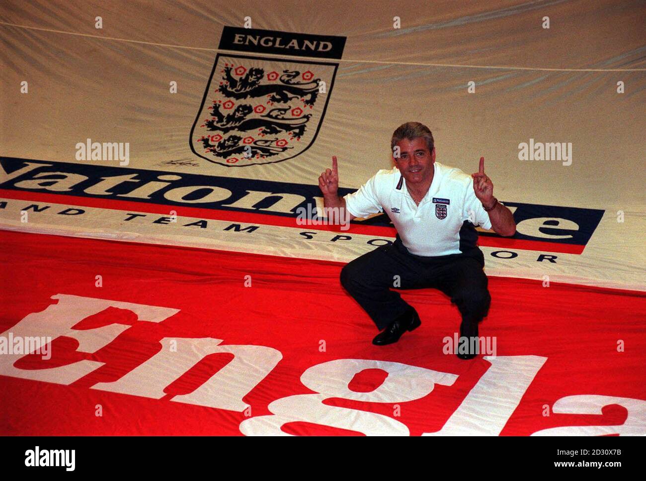 England coach Kevin Keegan made English football's biggest ever signing, which is set to play a key role in his team's quest for Euro 2000 glory when the tournament kicks off in Holland and Belgium.   *  The signing won't be measured in sterling but in fan's signatures on the world's largest football shirt measuring a giant 60ft x 60ft officially launched at the Hilton London Metropole Hotel, the England coach lent his support to the initiative and signed the shirt which will tour around the country, which is hoped will culminate in a record for the world's largest signed football shirt. Stock Photo