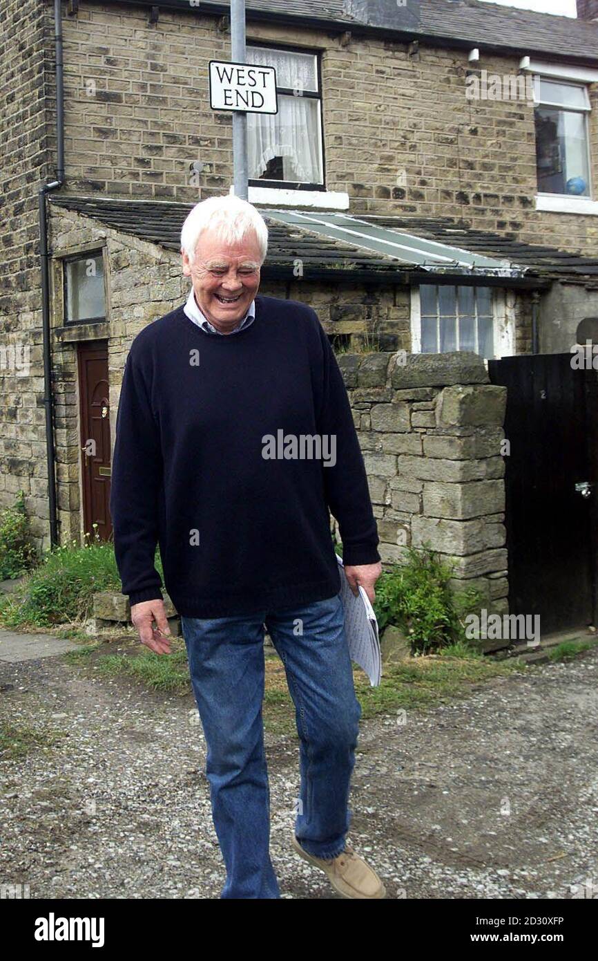 Actor Tony Booth, father of Cherie Blair approaches reporters outside