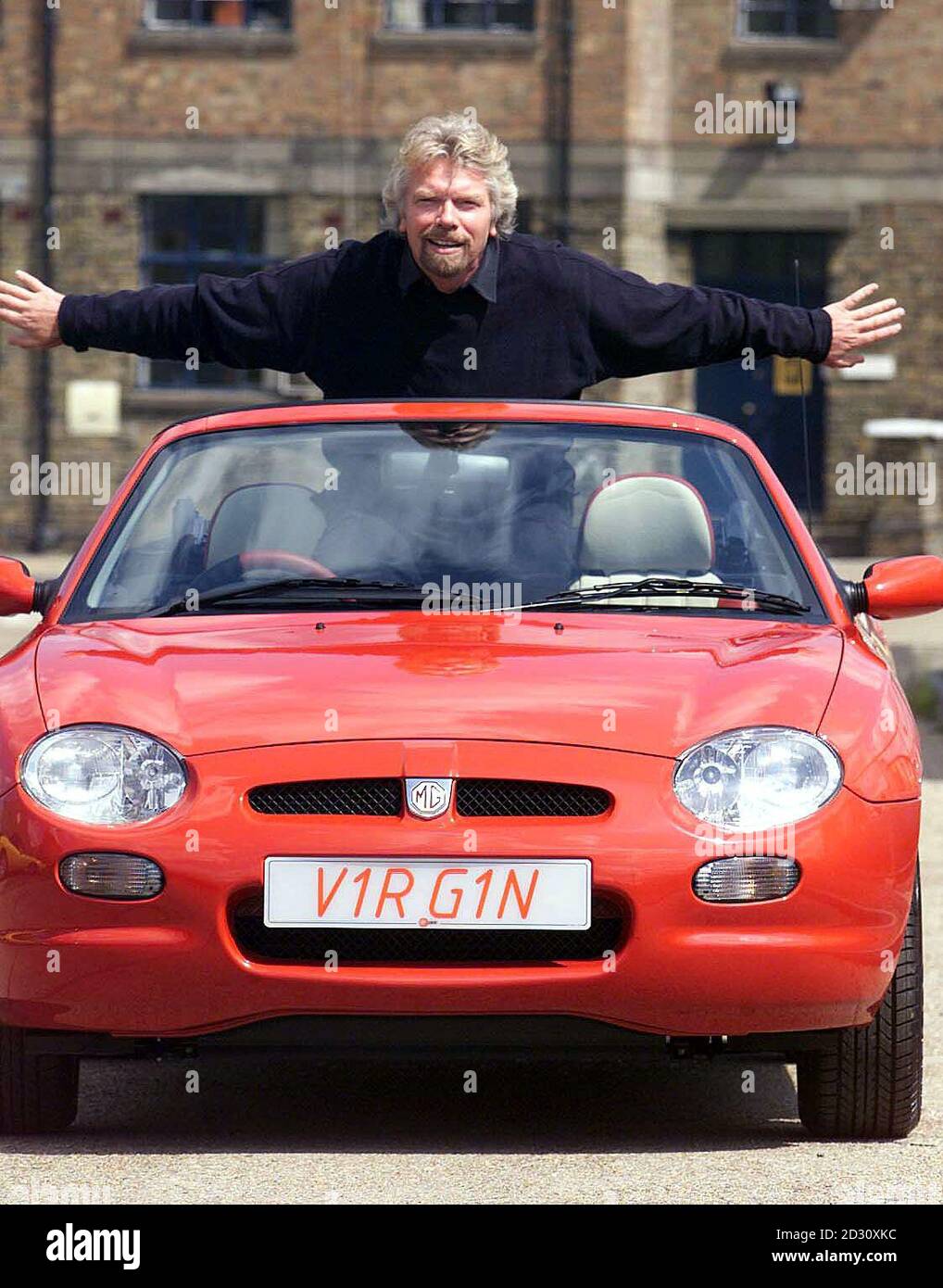 Virgin boss Sir Richard Branson at the launch of Virgin Cars in London. The service via internet (www.virgin.com/cars) promises consumers a saving on cars of up to 30% lower than existing prices. Stock Photo