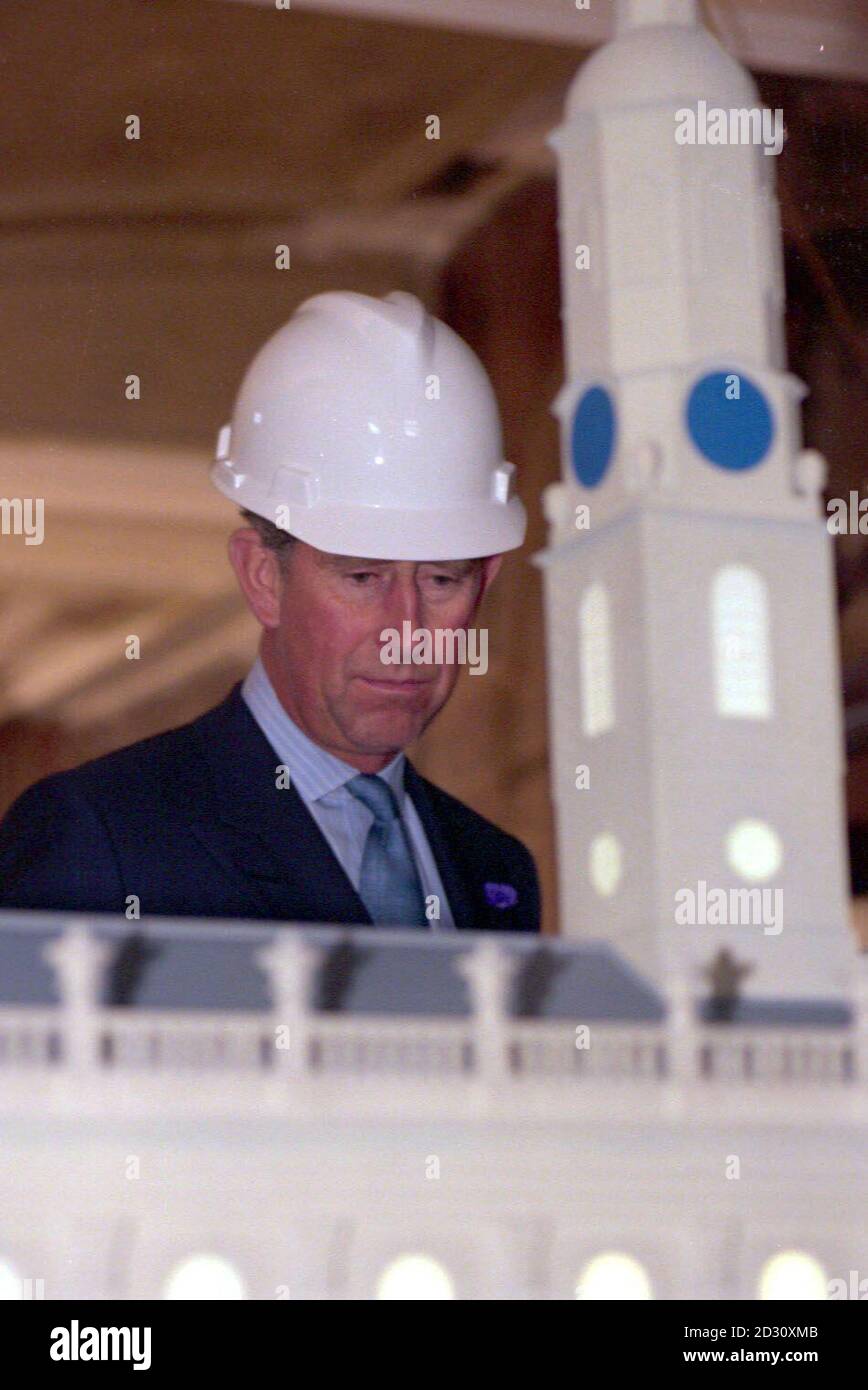 The Prince of Wales is shown a model of the restoration plan by architect Nicholas Groves-Raines, during a visit to the former church of St Andrews in the Square in Glasgow, a category 'A' listed building which is being converted for use as the Early Scottish Music venue. Stock Photo
