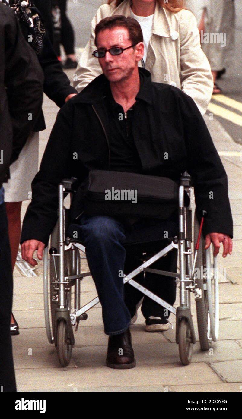 Gary Reid, who was injured during the Soho bomb attack in April 1999 arrives at the Old Bailey in London, for the trial of the nail-bomber David Copeland, 23, who is accused of murdering three people at the Admiral Duncan pub. Stock Photo