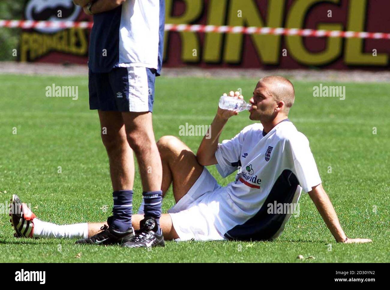 Football drinking celebrity training david beckham hi-res stock