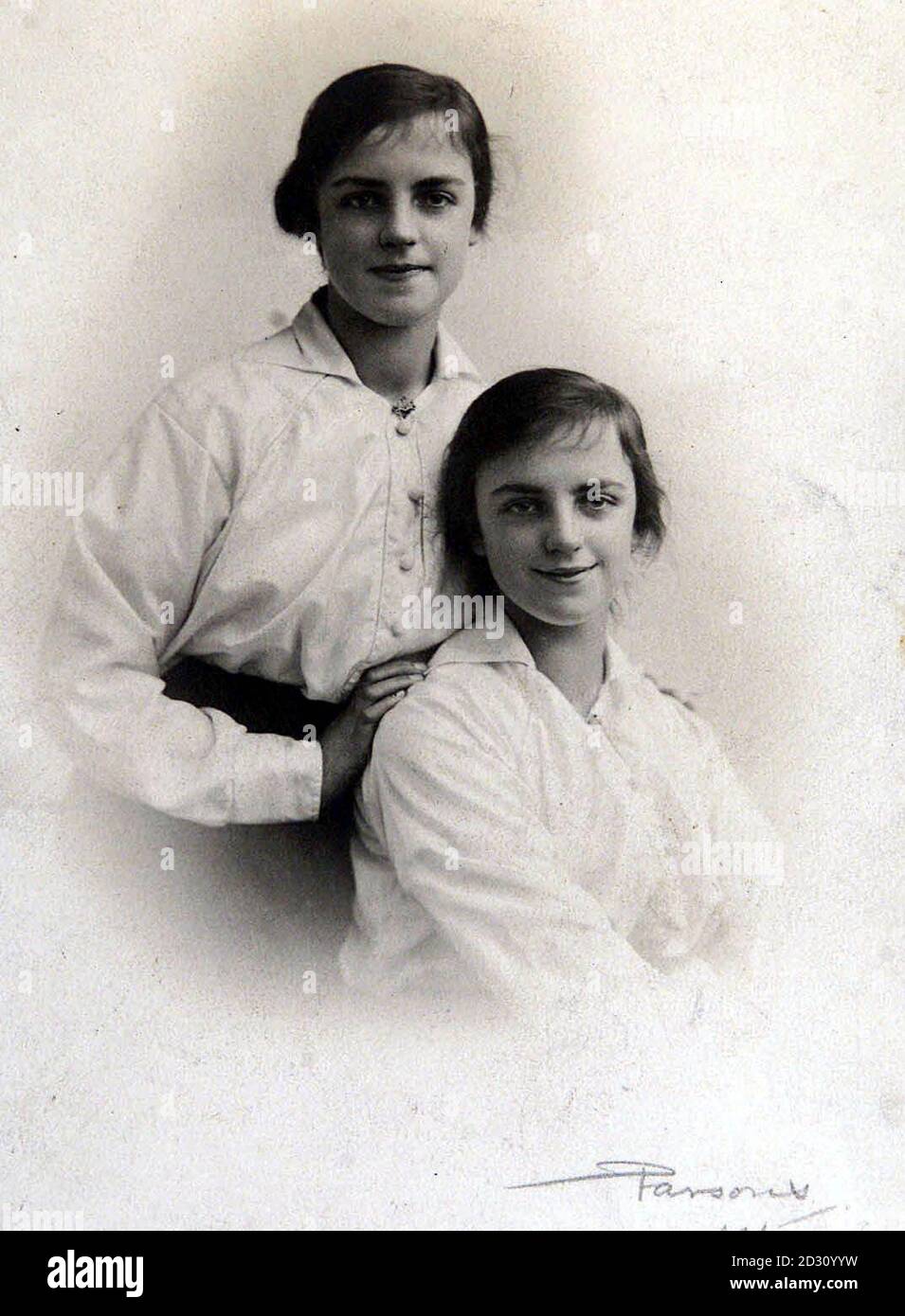 A 1915 picture of Britain's oldest twins Nellie and and Alice Clarke who were celebrating their 100th birthday.  The identical twins, who lived the high life as wealthy debutantes, marked their centenary with a party at a retirement home in Manchester.   * Their birthday has earned them a place in the Book of Guinness World Records as the UK's oldest living twins.  A spokeswoman for the publication said the chances of identical twins reaching 100 were one in 700 million.    Stock Photo