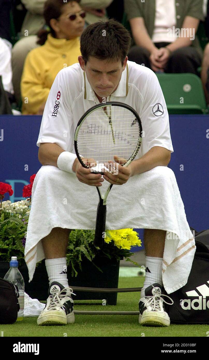 Disappointment for Britain's Tim Henman as he loses to Sweden's Jonas Bjorkman during the Nottingham Open. Henman lost 7-5, 4-6, 5-7. Stock Photo