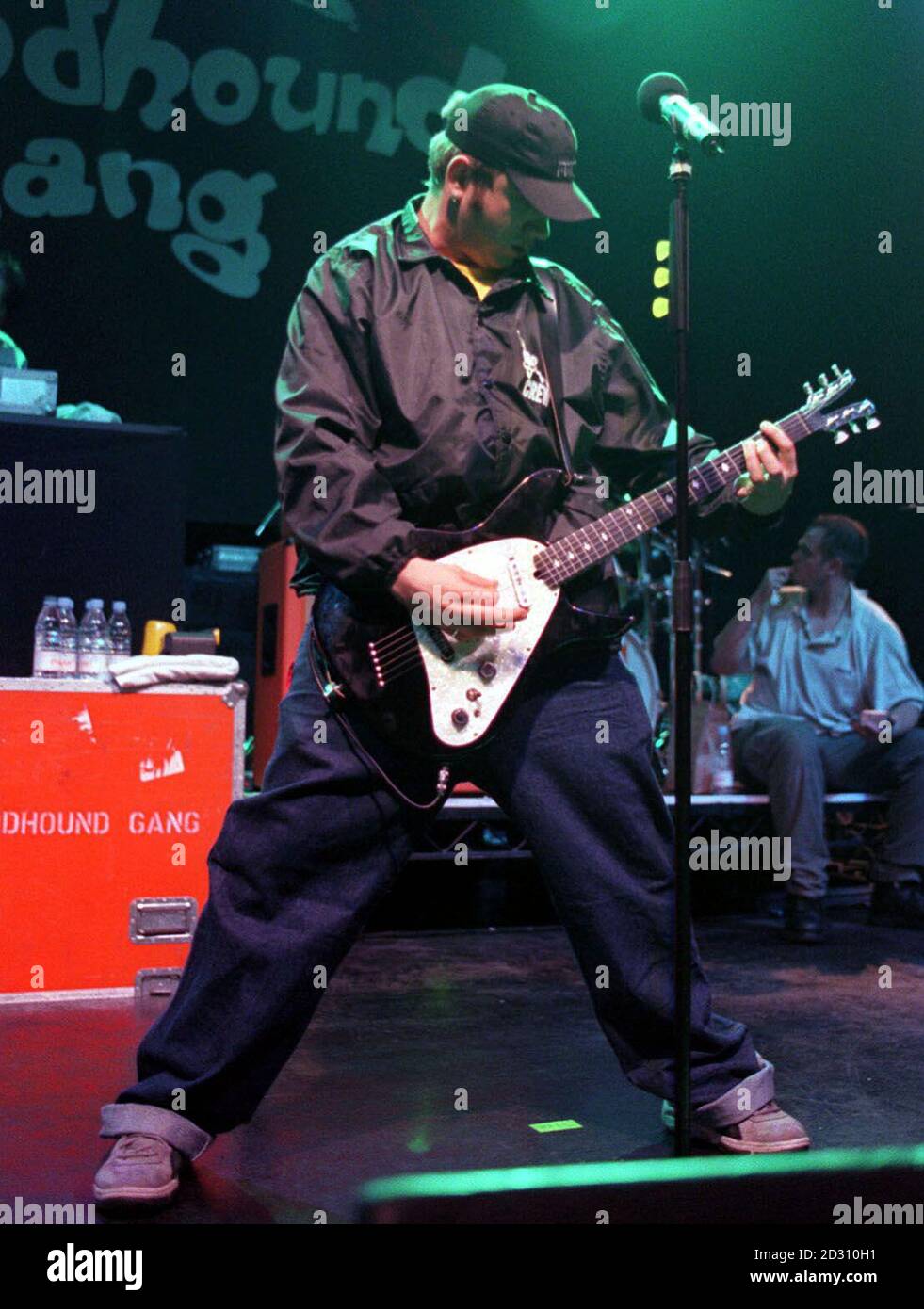 Singer Jimmy Pop Ali of American hip-hop rock band the Bloodhound Gang,  strikes a pose with his guitar on stage at the Astoria, London Stock Photo  - Alamy