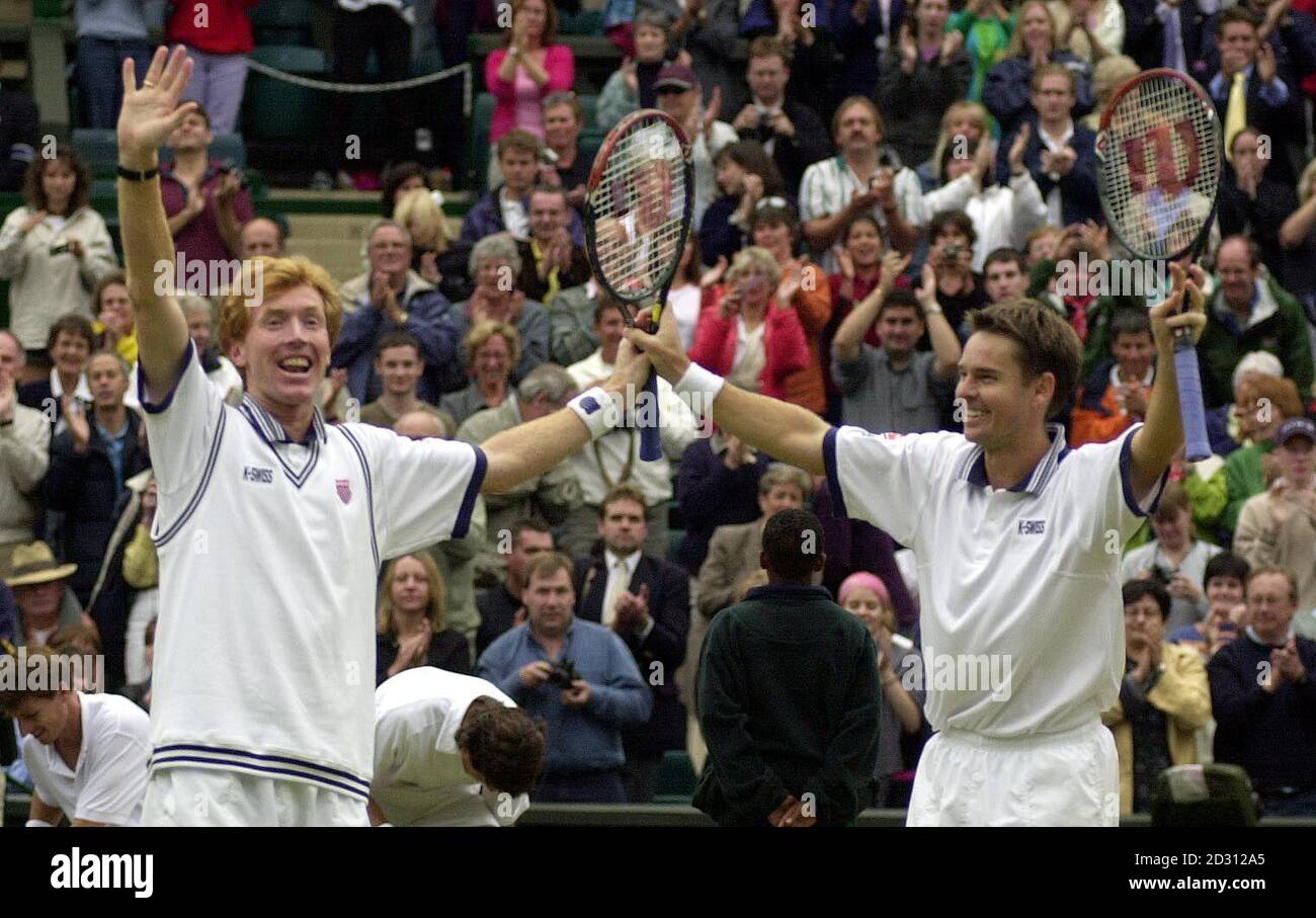 NO COMMERCIAL USE: Mark Woodforde (l) and Todd Woodbridge celebrate their 6/3 6/4 6/1 victory over Paul Haarhuis and Sandon Stolle in the final of the Gentlemen's Doubles at Wimbledon. Stock Photo