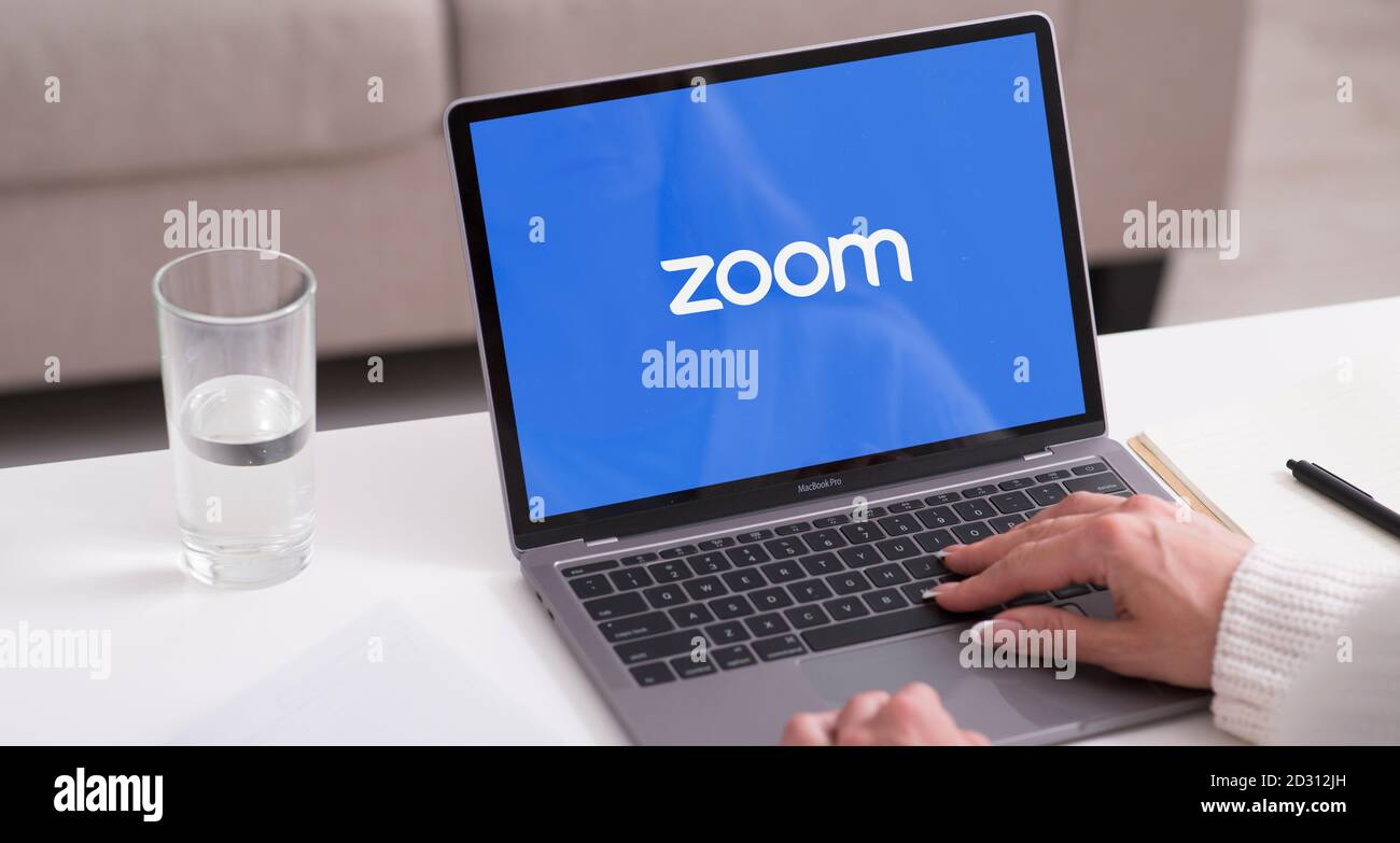 Laptop showing Zoom Cloud Meetings app logo Stock Photo - Alamy