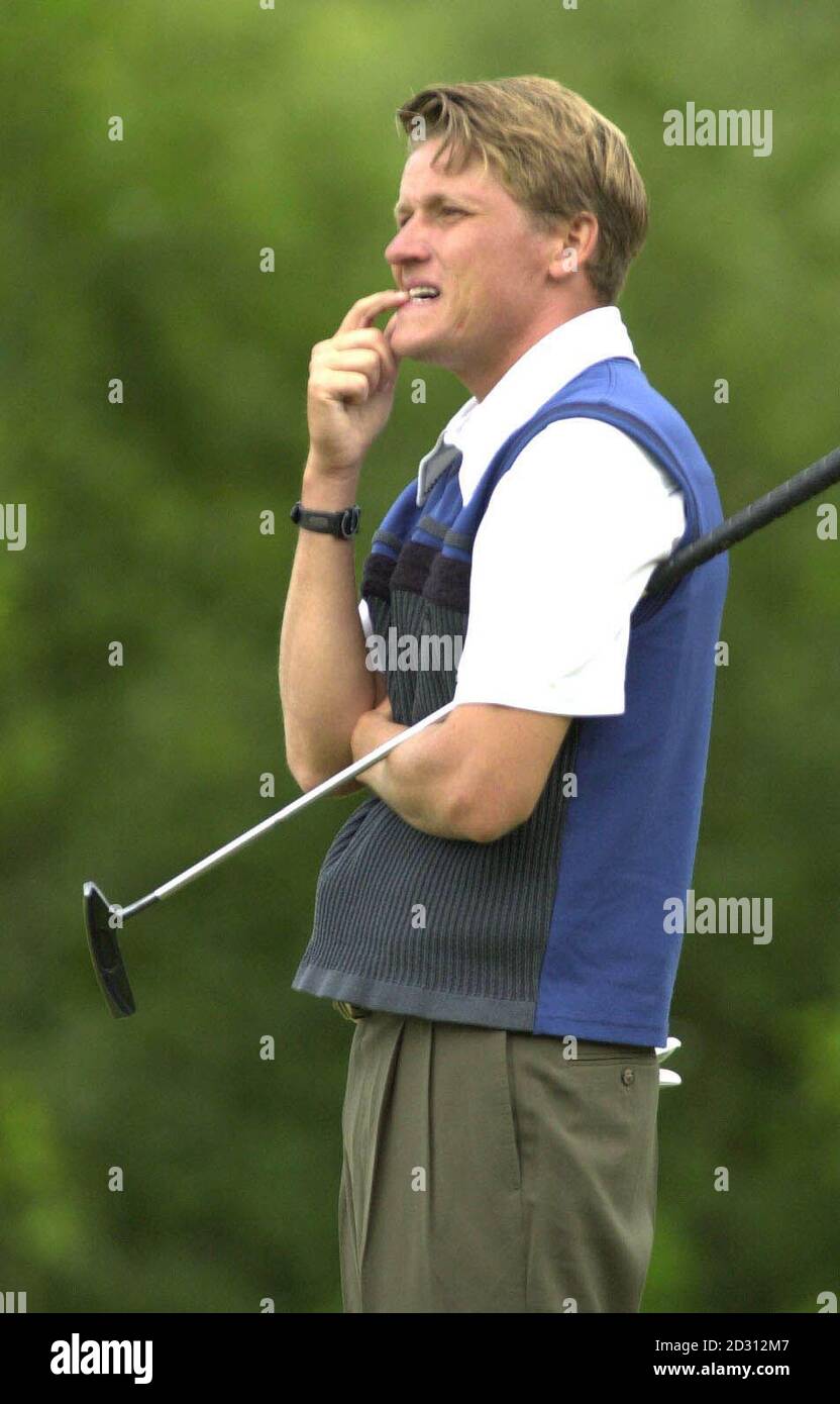 Sweden's Jarmo Sandelin deliberates his next shot at the 18th hole on the first day of the Standard Life Loch Lomond Golf tournament. Stock Photo