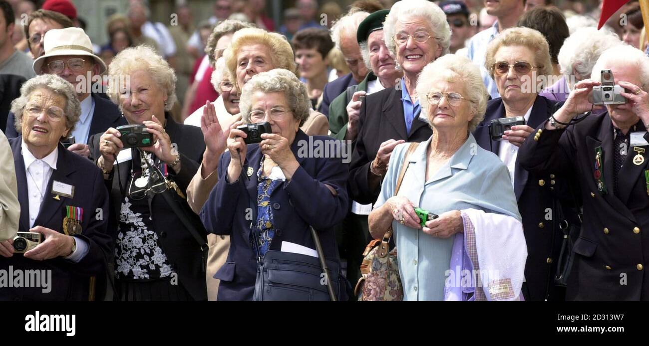 Former 'Ack Ack' girls and ATS members line up to take photographs of the retiring Speaker of the House of Commons, Betty Boothroyd, who was taking the Salute at their March Past following a Service in York Minster.   * ... Ms Boothroyd was invited to take the salute in her role as patron of the Memorial to the Women of World War II Charity which is campaigning to have a tribute to women veterans erected in London.  Stock Photo