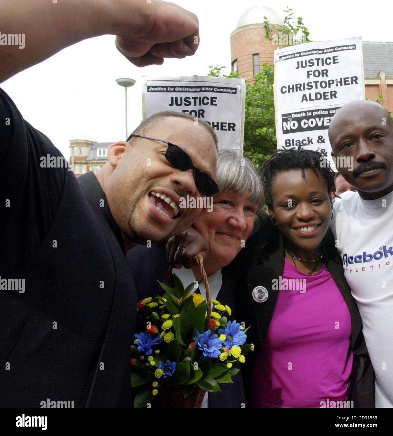 Janet Alder, centre right, who has campaigned for justice in the death of her brother Christopher Alder, a black former paratrooper who died in handcuffs in police custody, stands with her brother Richard, right, supporter Ruggi Johnson, left. * and solicitor Ruth Bundy, outside Hull Crown Court, where an inquest ruled the death an unlawful killing. Christopher Alder, 37, who was decorated for his service with the Army in Northern Ireland, died with his hands cuffed behind his back and his trousers around his knees on the floor of the custody suite of Queen's Gardens police station in Hul Stock Photo