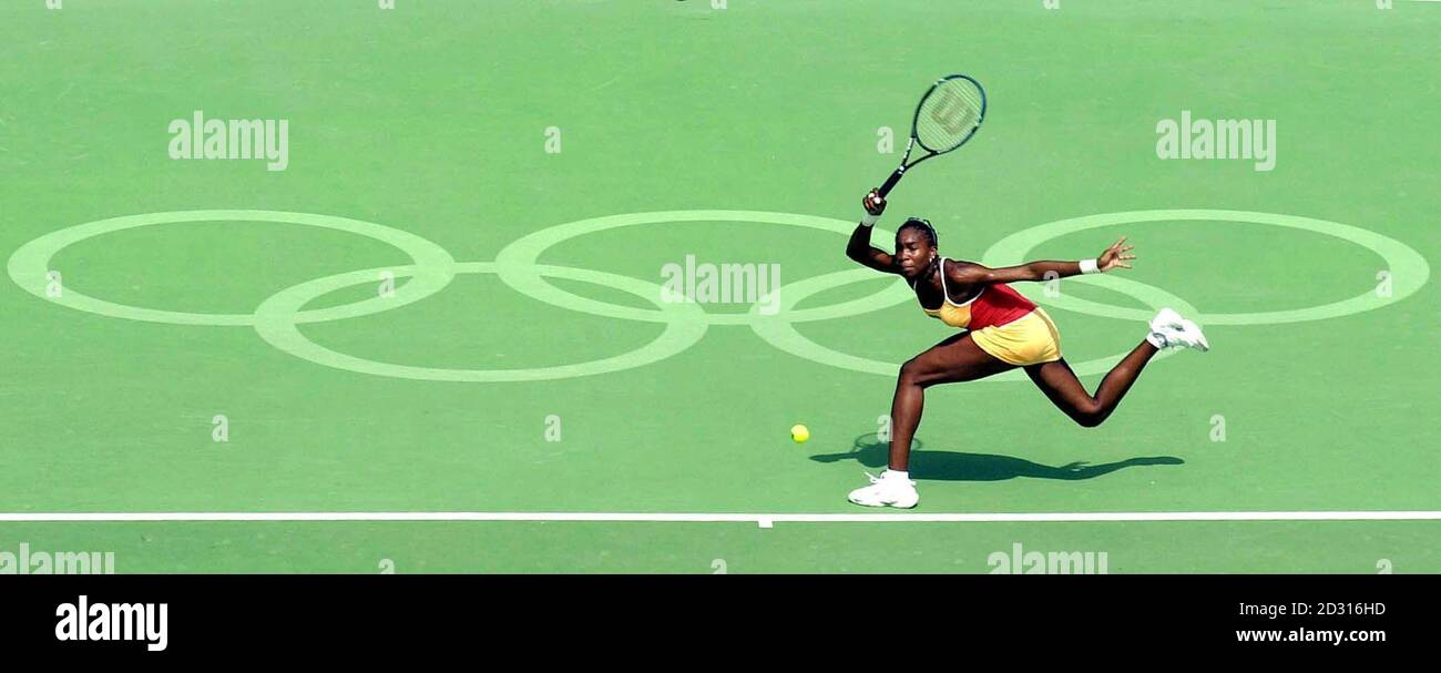 America's Venus Williams in action against Thailand's Tamarine Tanasugarn during the Women's Singles second round match at the Olympic Games in Sydney. Williams defeated Tanasugarn 6/2 6/3. Stock Photo
