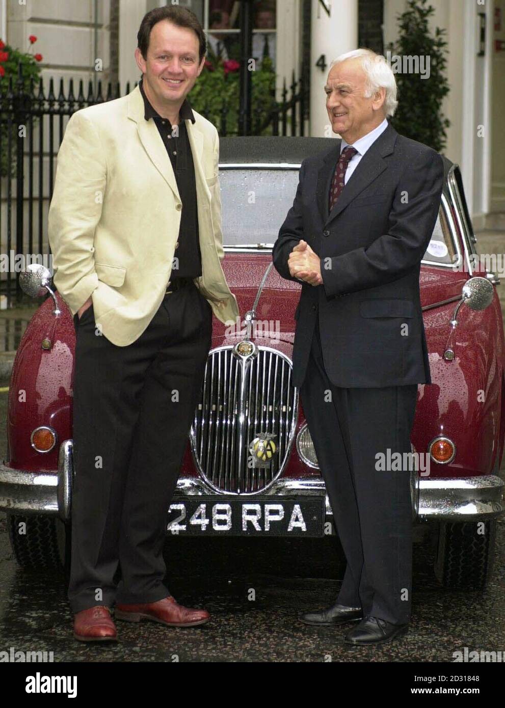 TV series Inspector Morse star John Thaw (right) and Kevin Whately, who plays Sgt Lewis, pose by Morse's Jaguar in St James's Square, central London,  before filming the last ever Inspector Morse.  Stock Photo