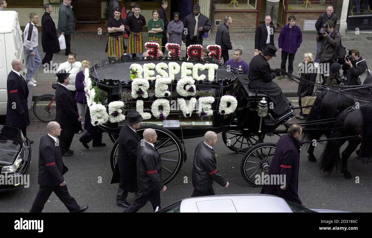 The horse drawn funeral cortege of former East London villain Reggie Kray, makes its way down Bethnal Green Road, after leaving a local undertaker. The gangland killer died a month after being freed from a life prison sentence on compassionate grounds.  *   and 10 days after leaving the Norfolk & Norwich hospital. After a service at St Matthew's Church, Tower Hamlets, he will be buried in the family plot at Chingford Mount Cemetery alongside his brother Ronnie and Charlie.  The Krays' gang, The Firm, had a Mafia-style grip on London's East End in the 1960s. Stock Photo