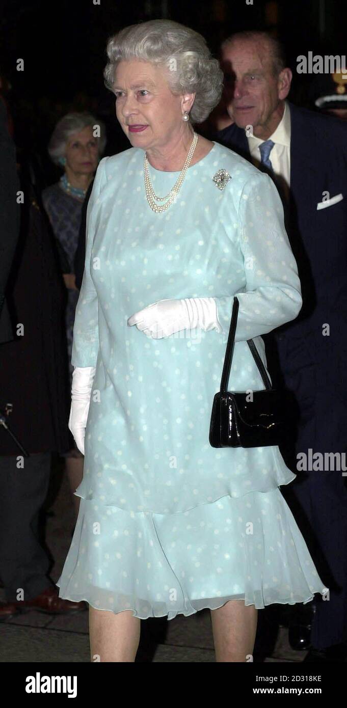 Queen Elizabeth II followed by Prince Philip arriving at La Scala Opera House, Milan, to see a performance of In The South by Edward Elgar. Riccardo Muti will conduct the La Scala Philharmonic Orchestra on the penultimate day of the state visit to Italy. Stock Photo